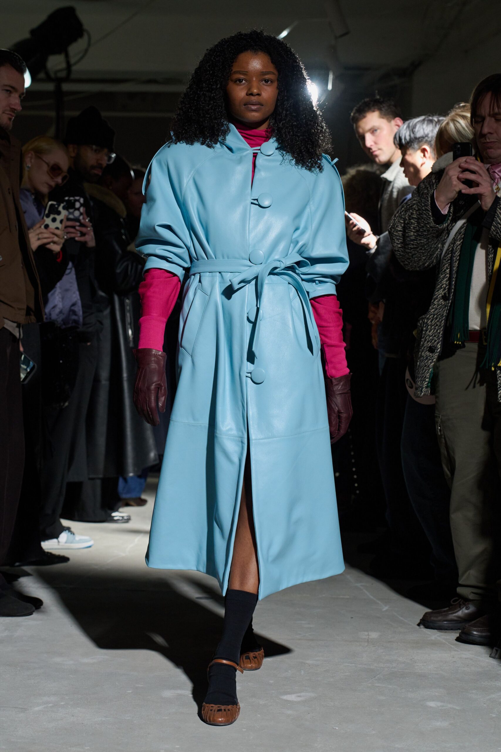blue leather long-sleeve collared relaxed belted buttoned coat