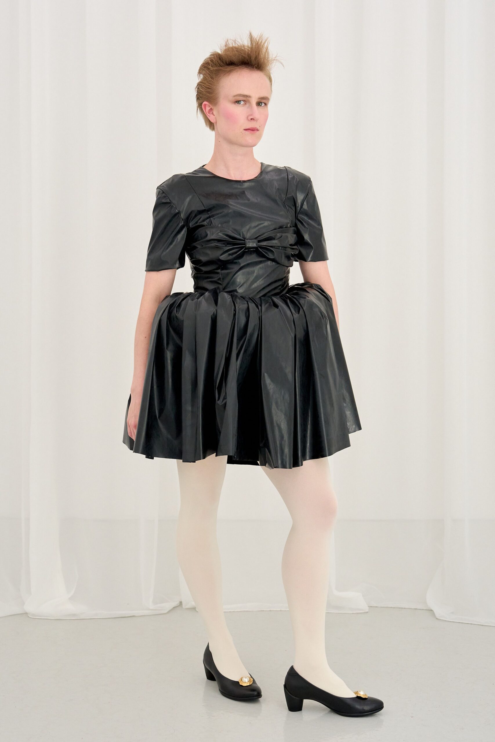 black vinyl short-sleeve v-neck fitted pleated draped dress