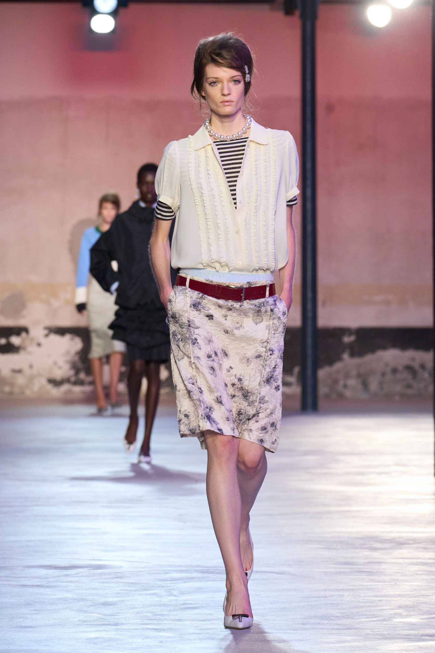 white fitted blouse with mini skirt