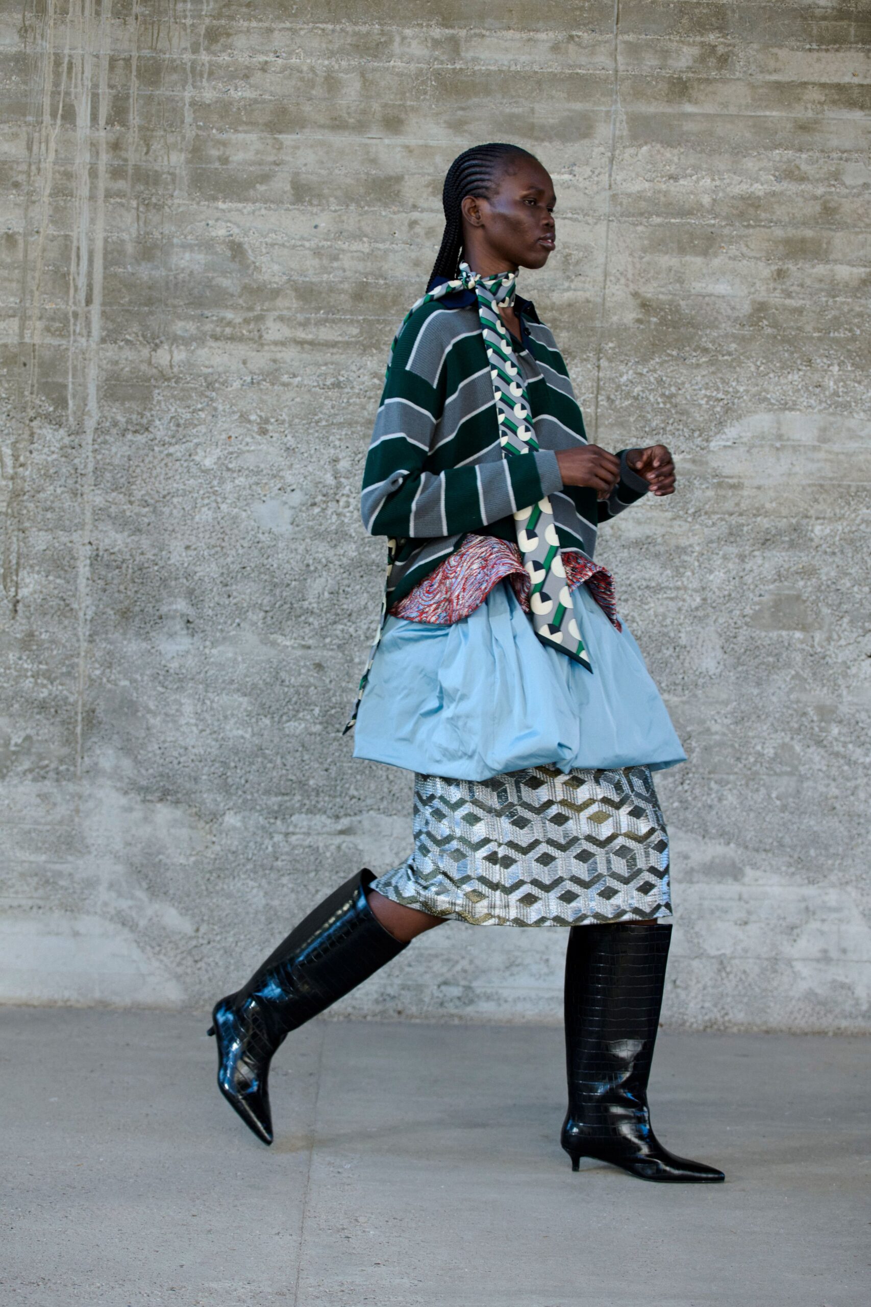 green striped top with blue skirt