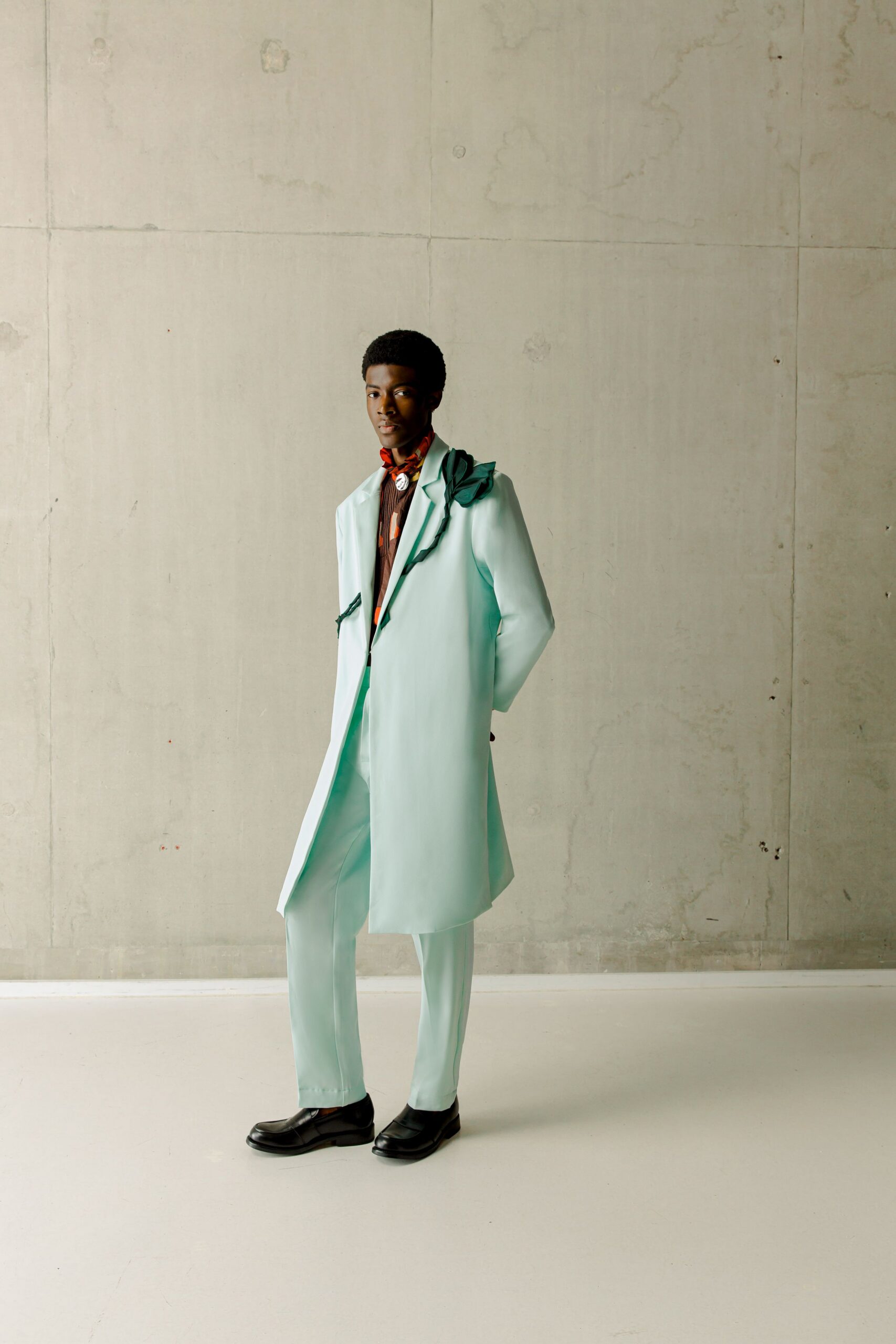 teal cotton long-sleeve collared structured buttoned coat