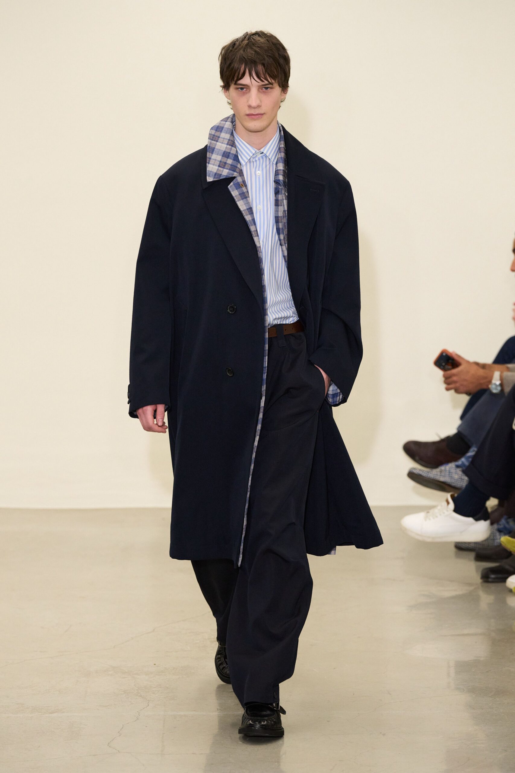 navy coat with striped shirt