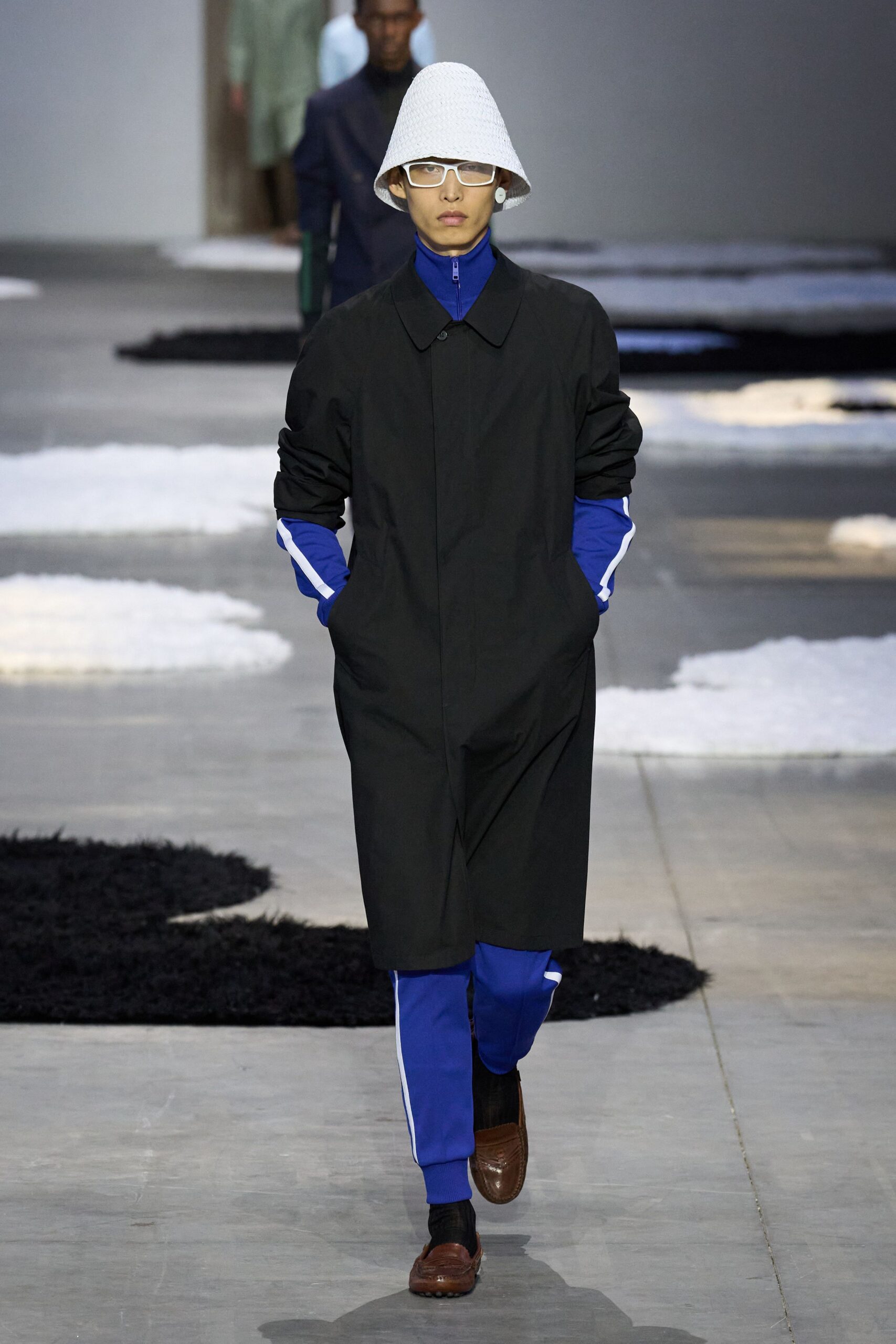black coat with blue pants