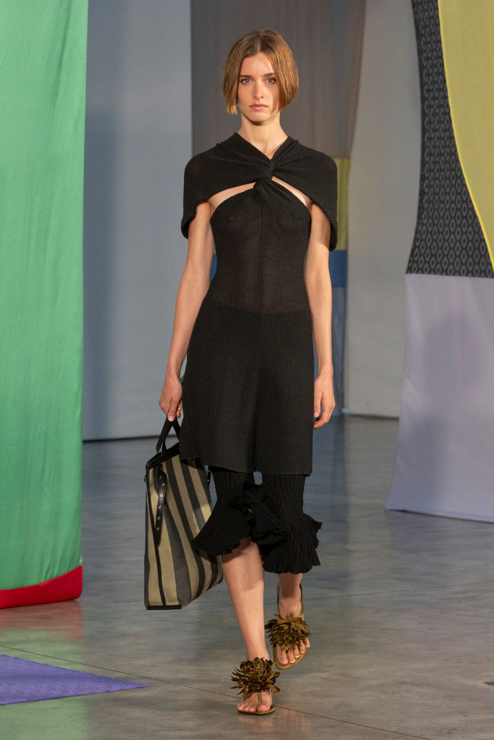 black fitted mini dress with pleats