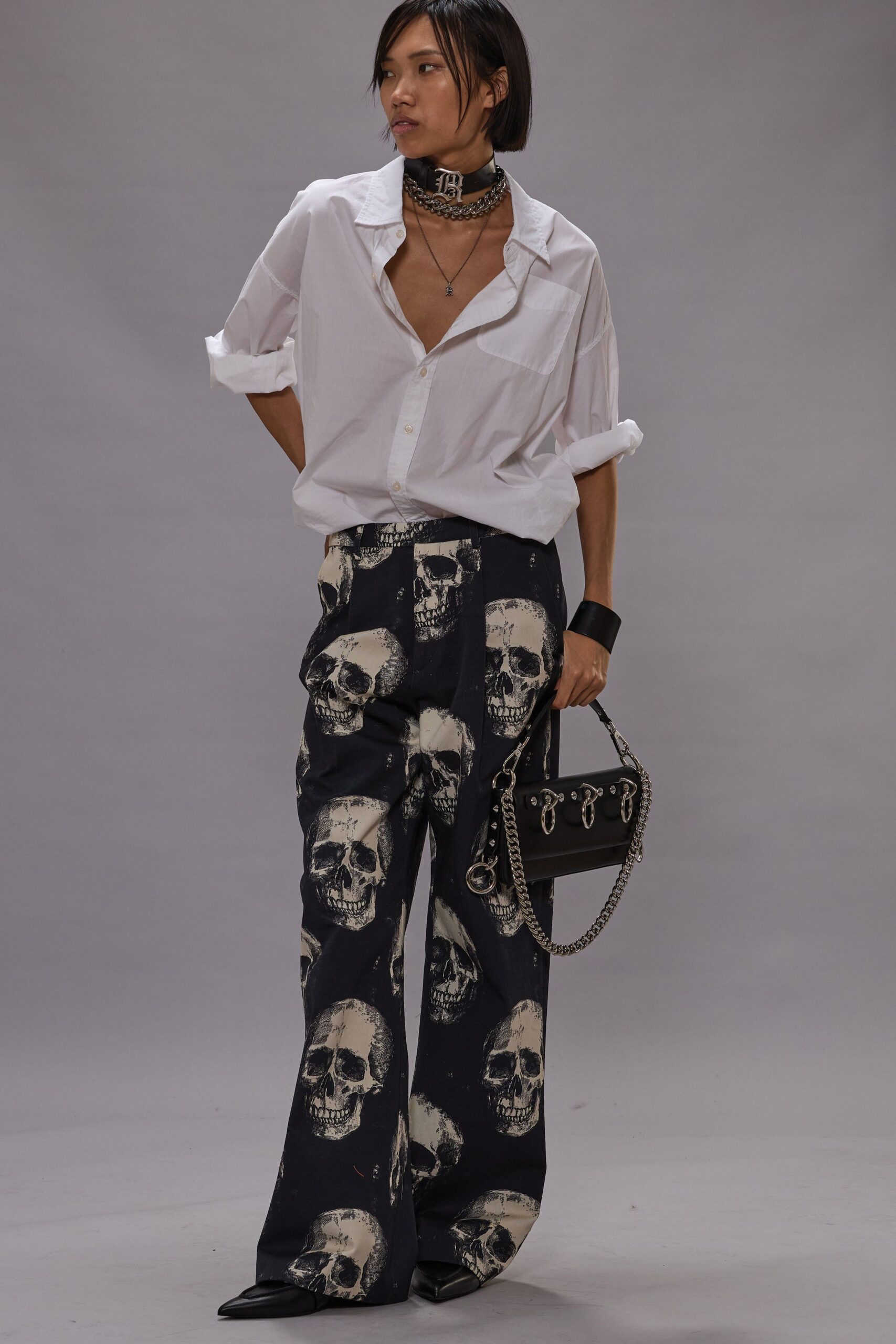 white shirt black printed pants