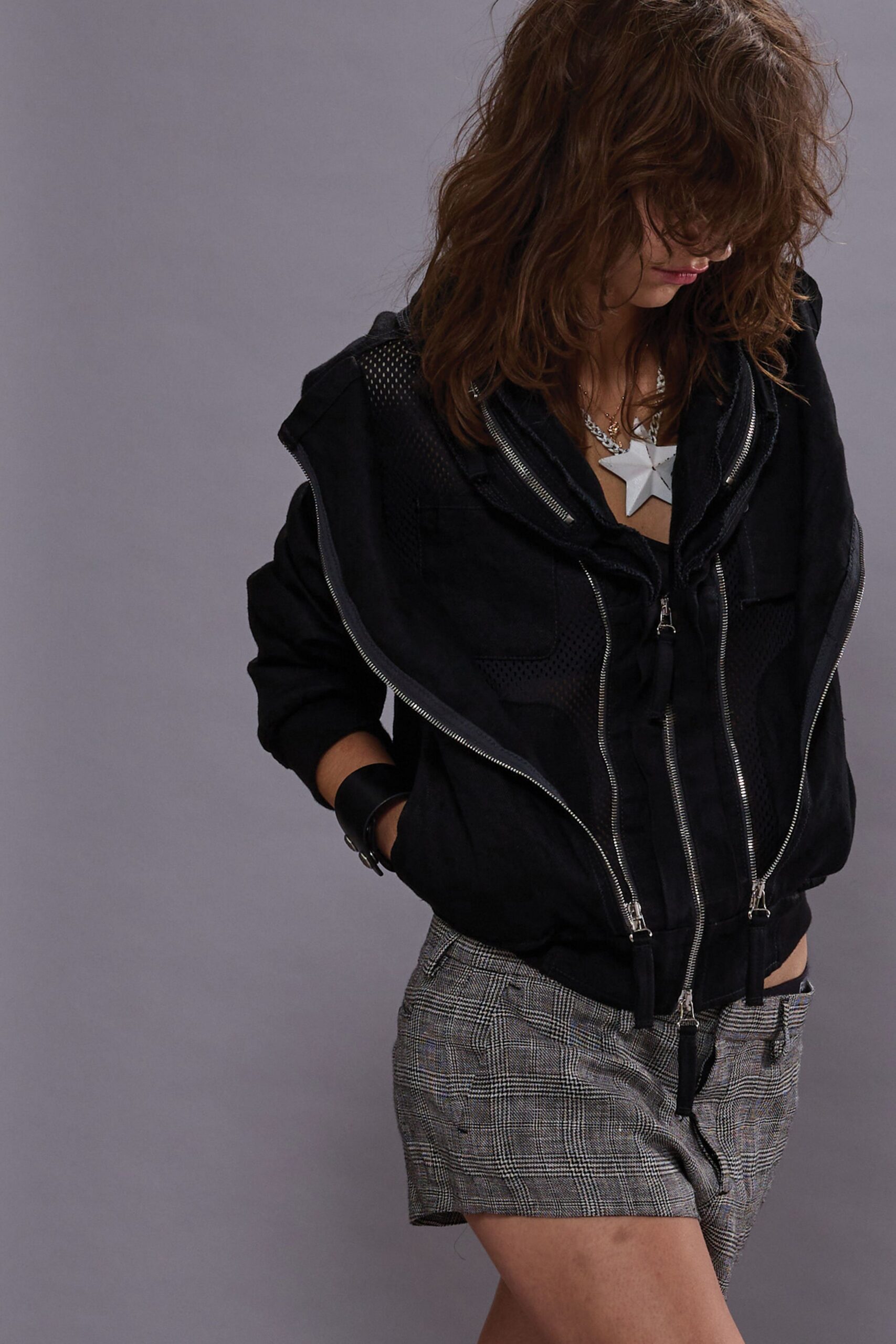 black relaxed jacket with gray shorts
