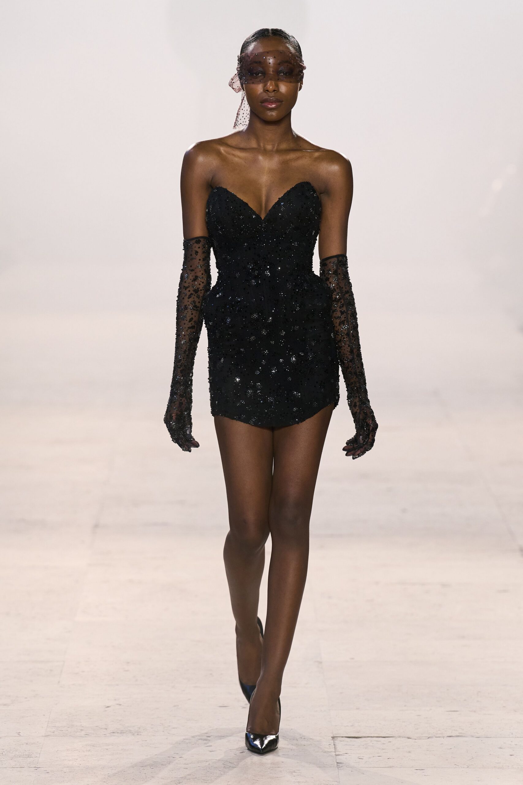 black mini-dress with gloves