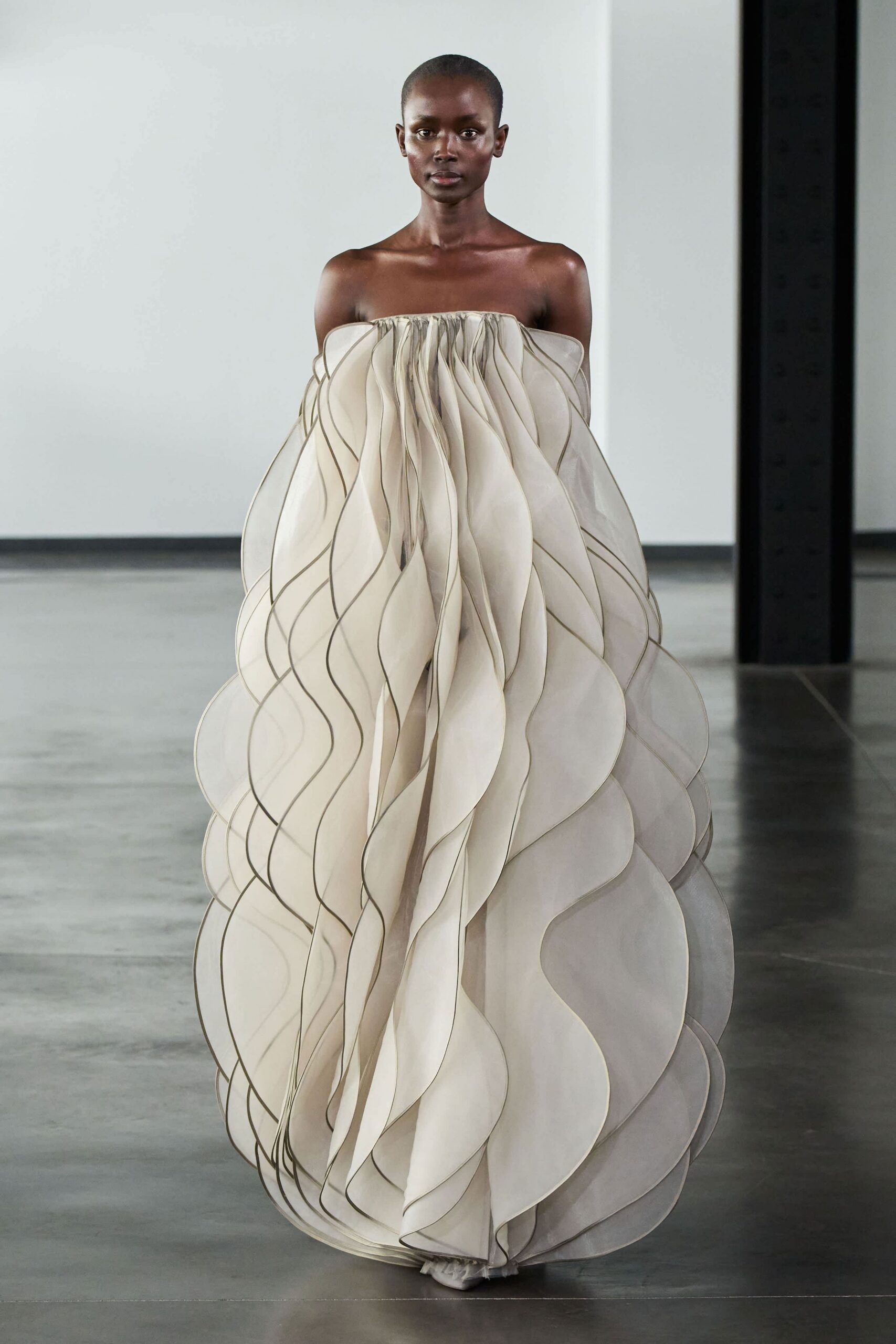 beige strapless layered gown