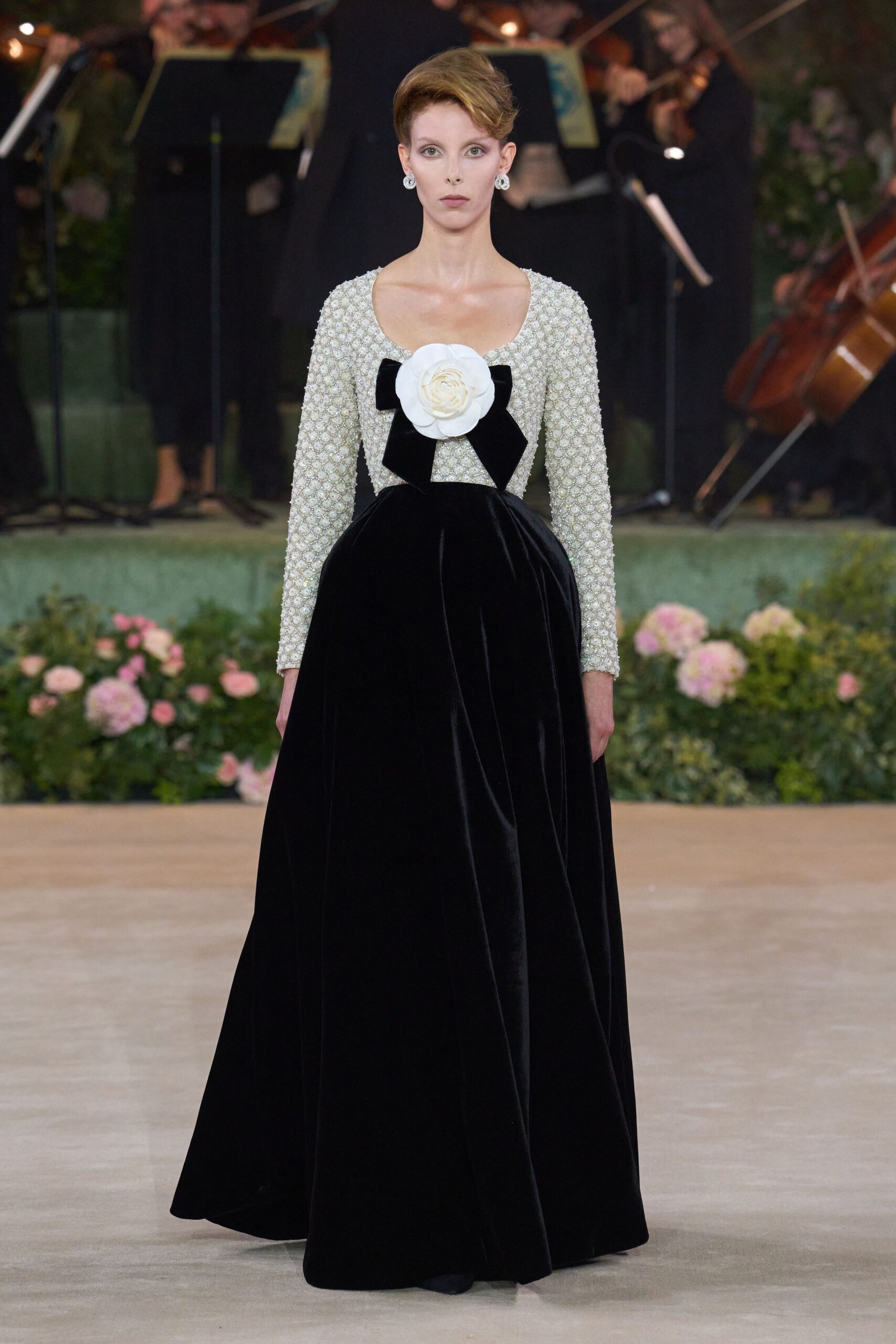 black velvet gown with white embellishment