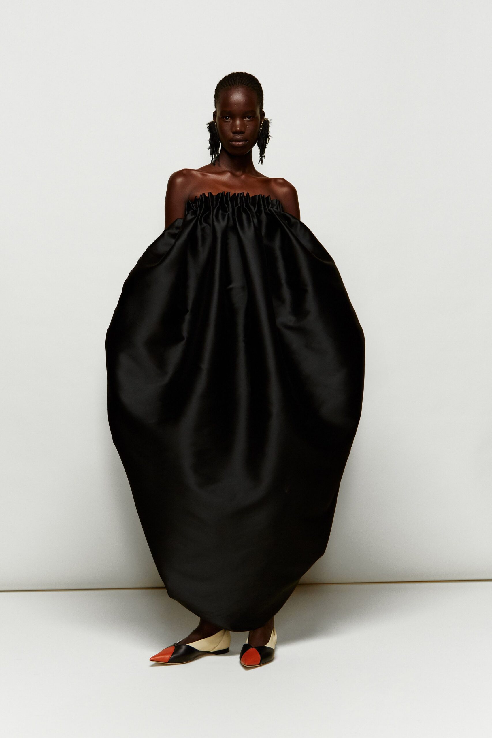 black silk strapless fitted draped flowing maxi dress