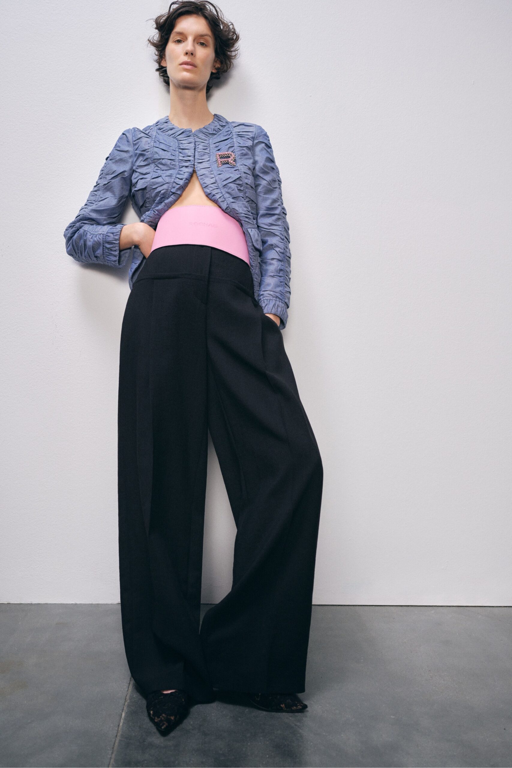 blue ruffled jacket with pink top
