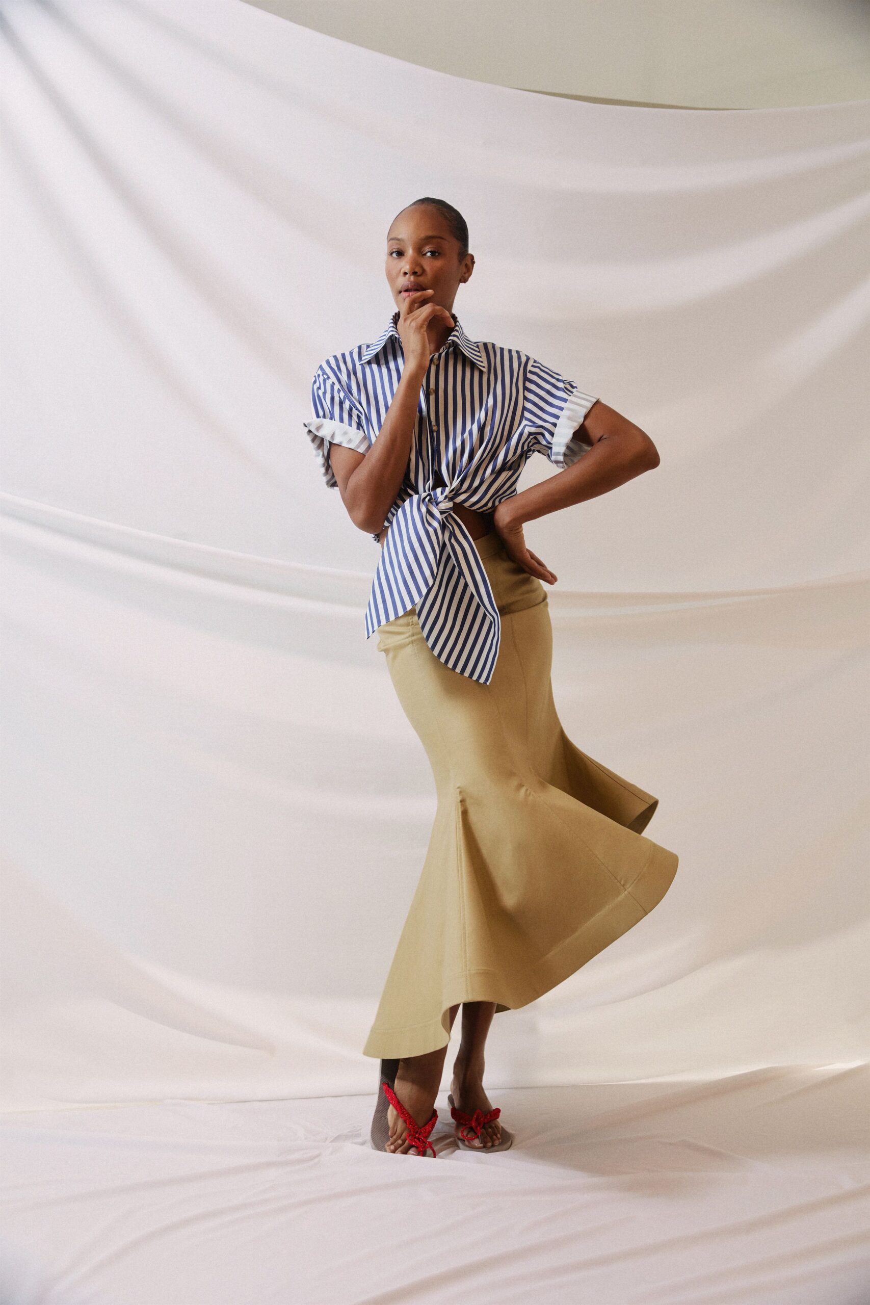 beige cotton fitted flared midi skirt
