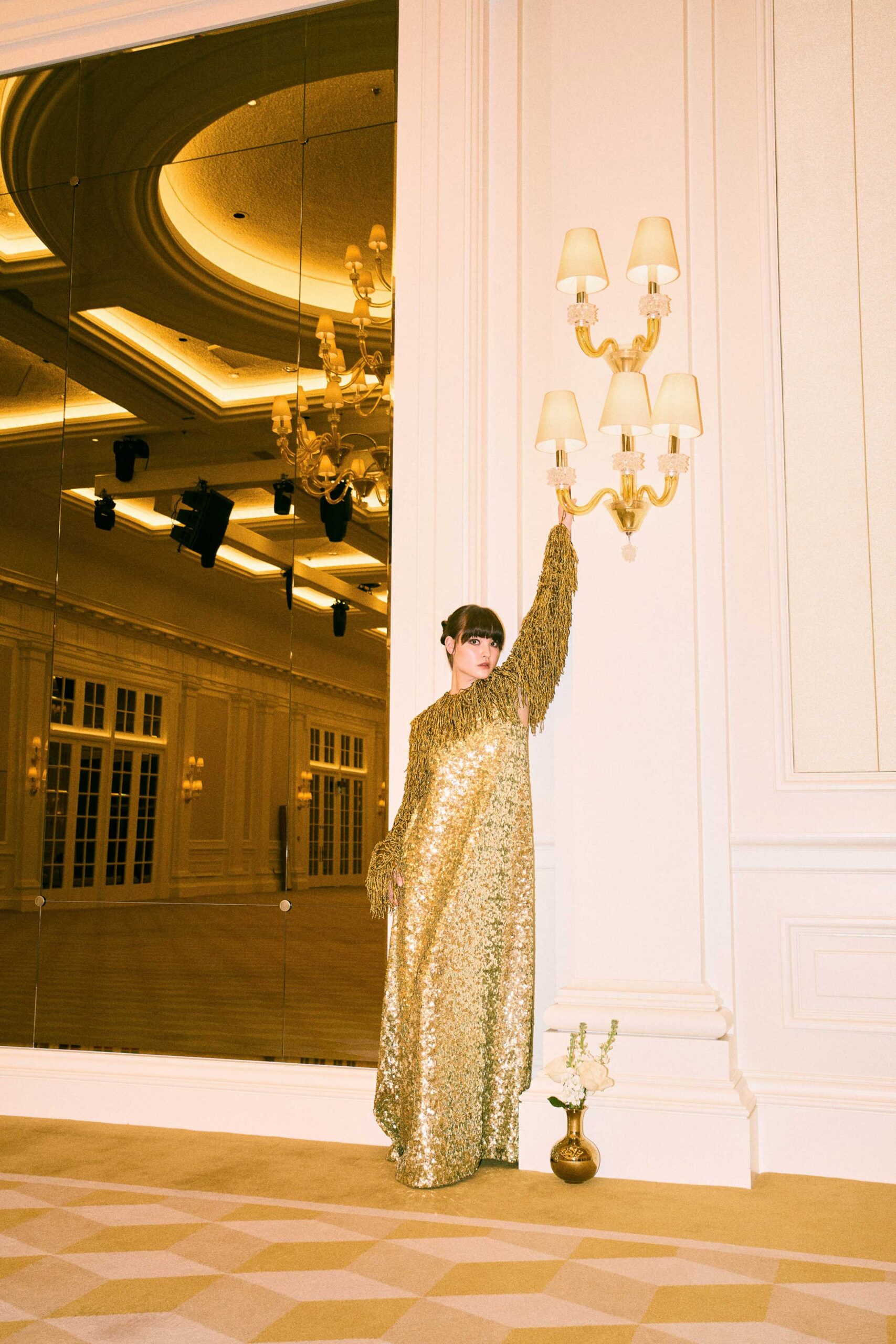 gold sequin long-sleeve gown