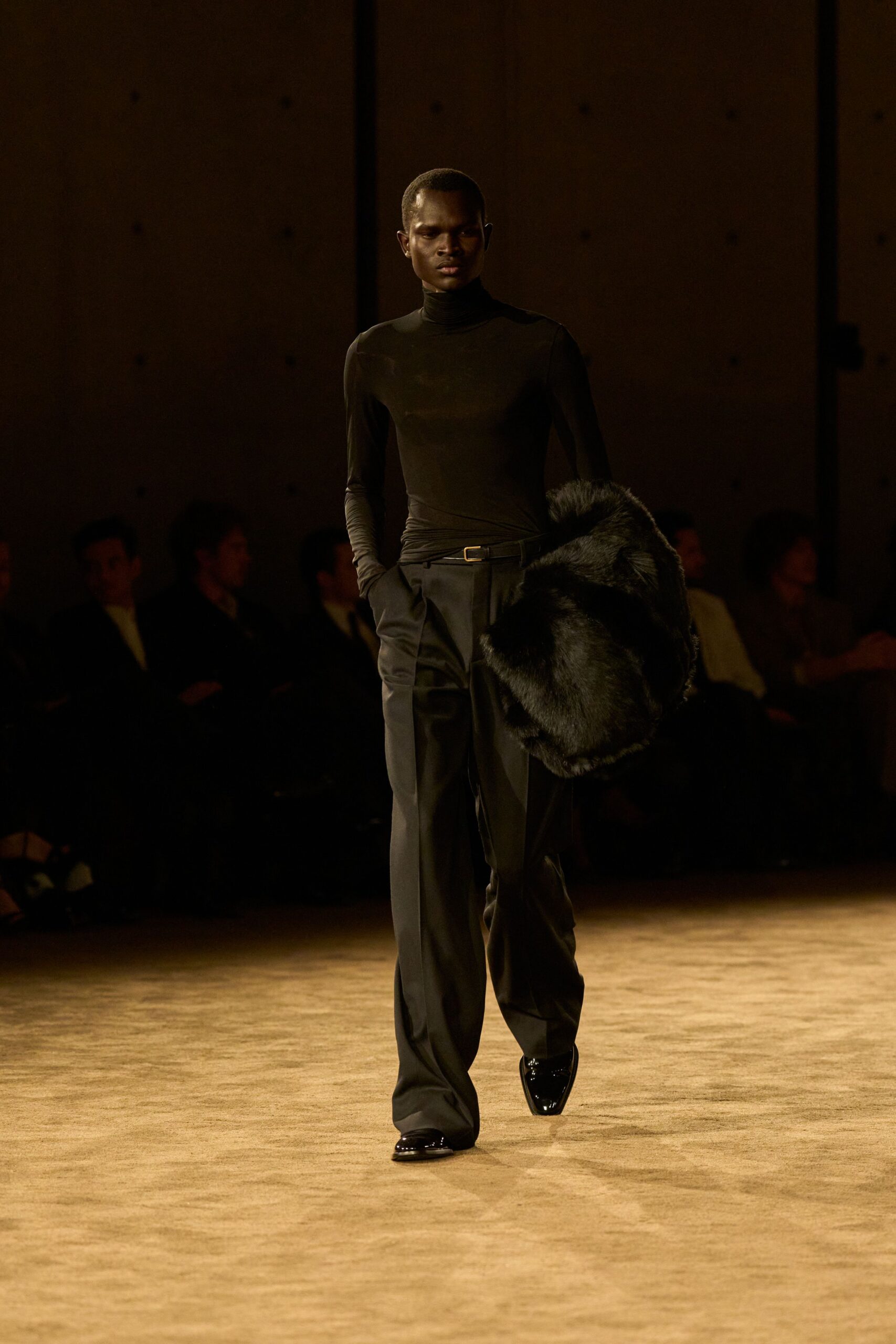 black fitted top and tailored pants