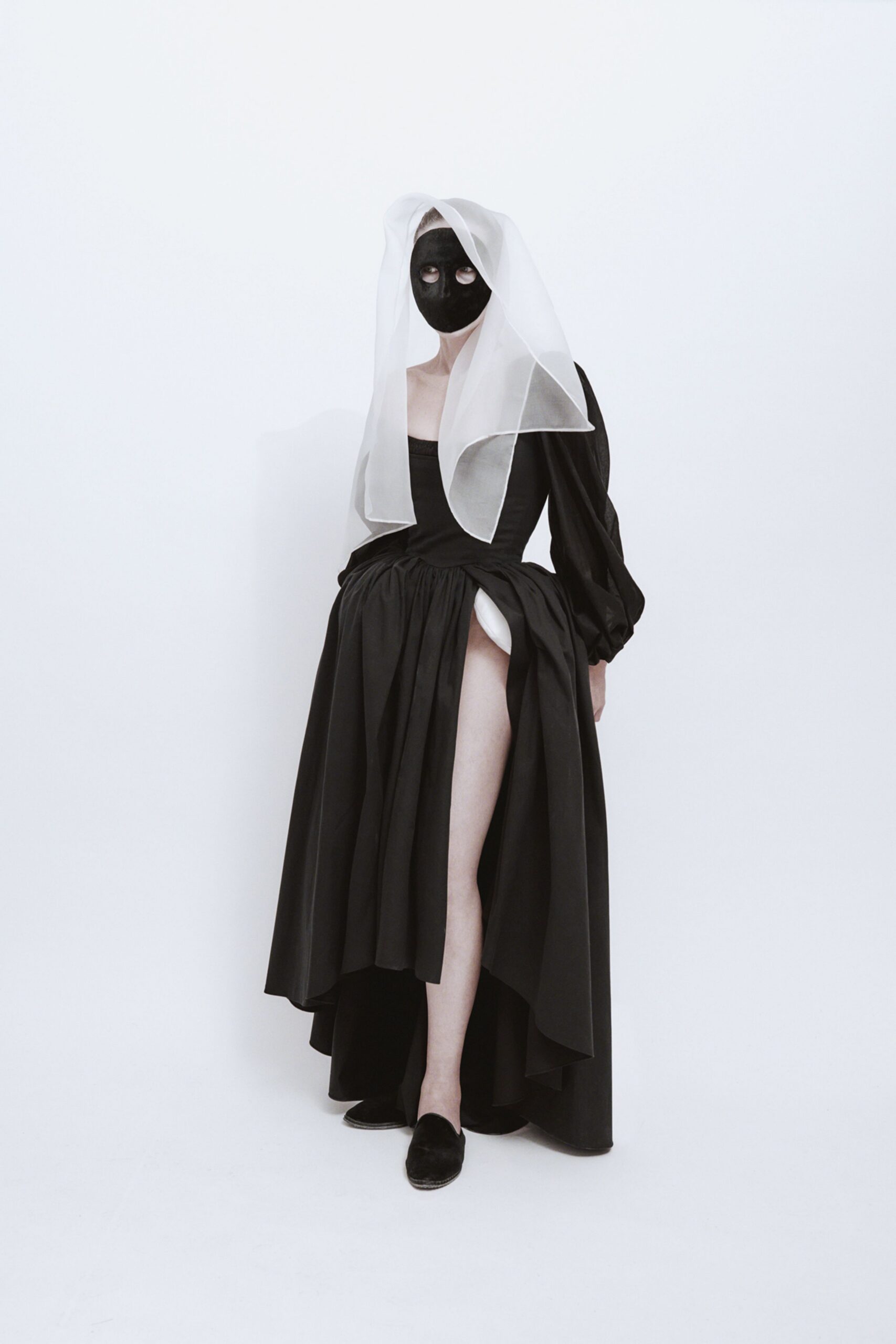 black fitted maxi dress with veil