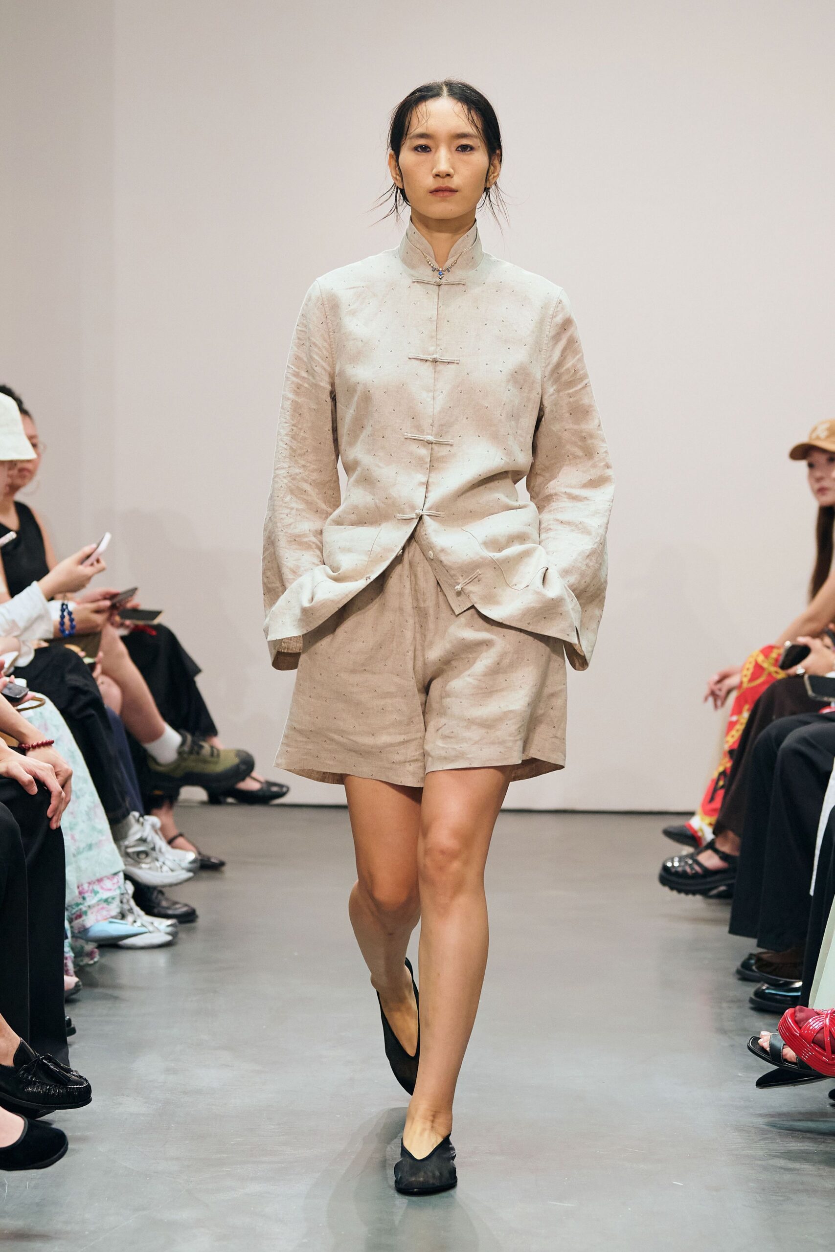 beige relaxed shirt and shorts