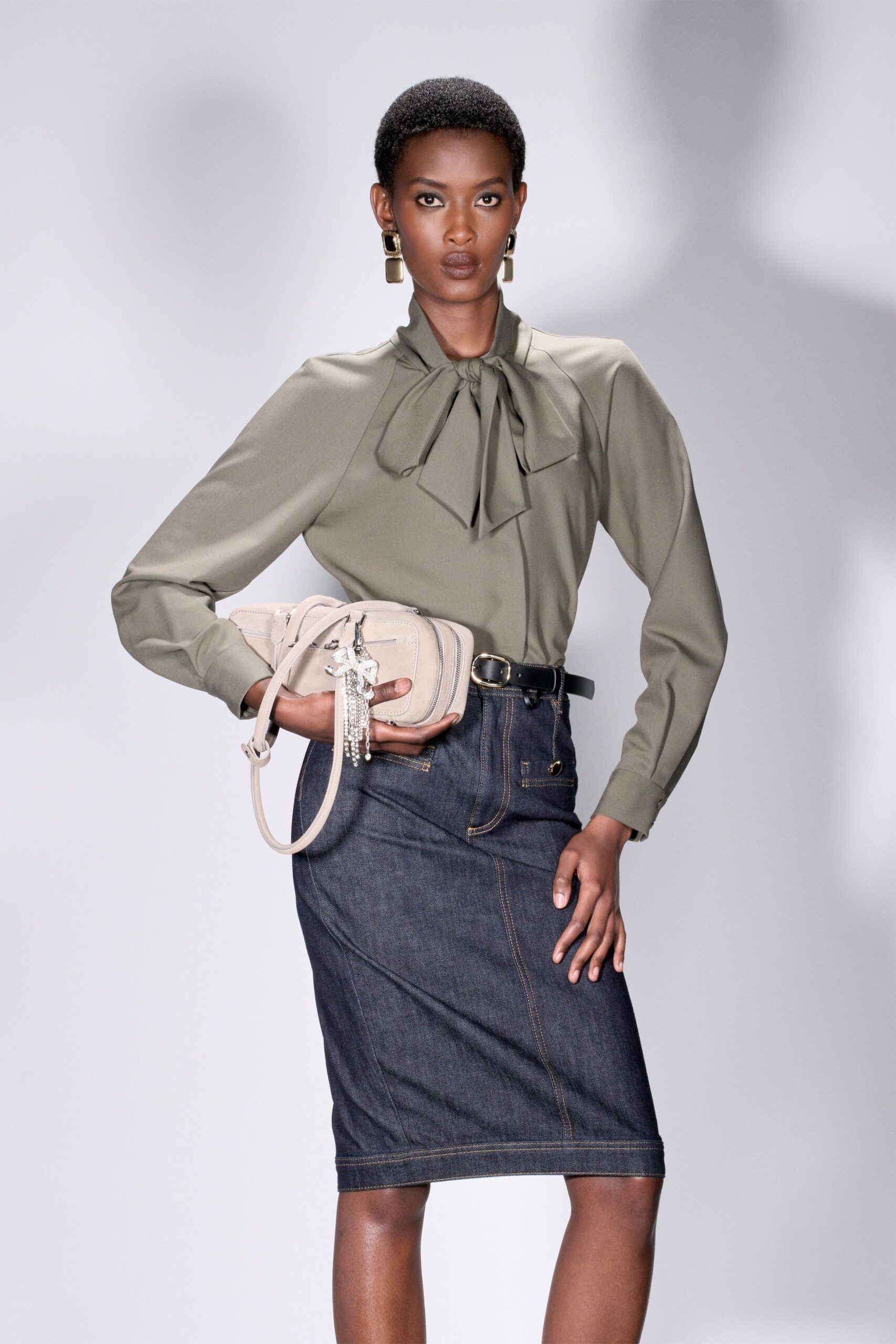 green silk long-sleeve collared fitted pleated blouse