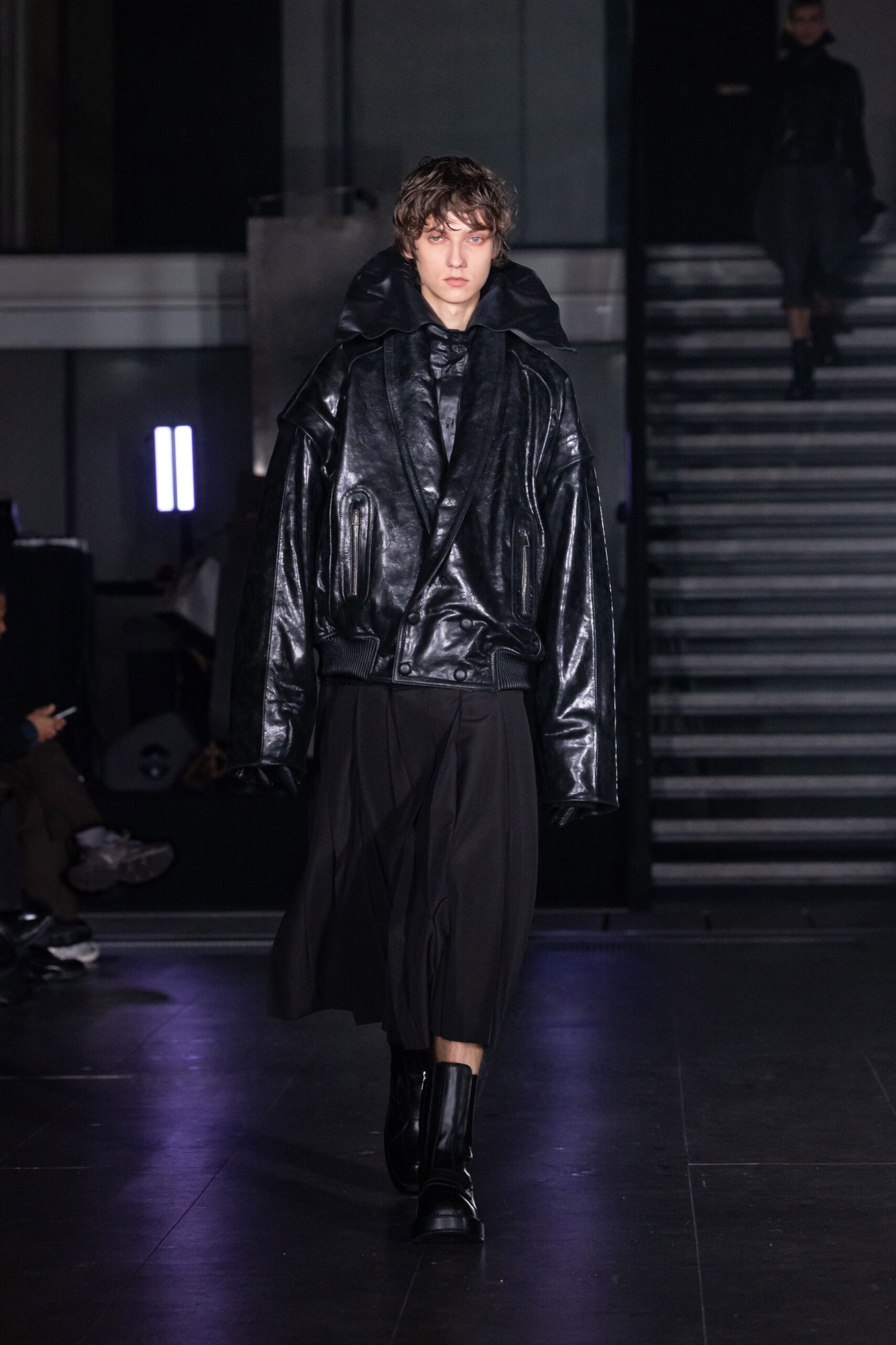 black leather oversized jacket and midi skirt