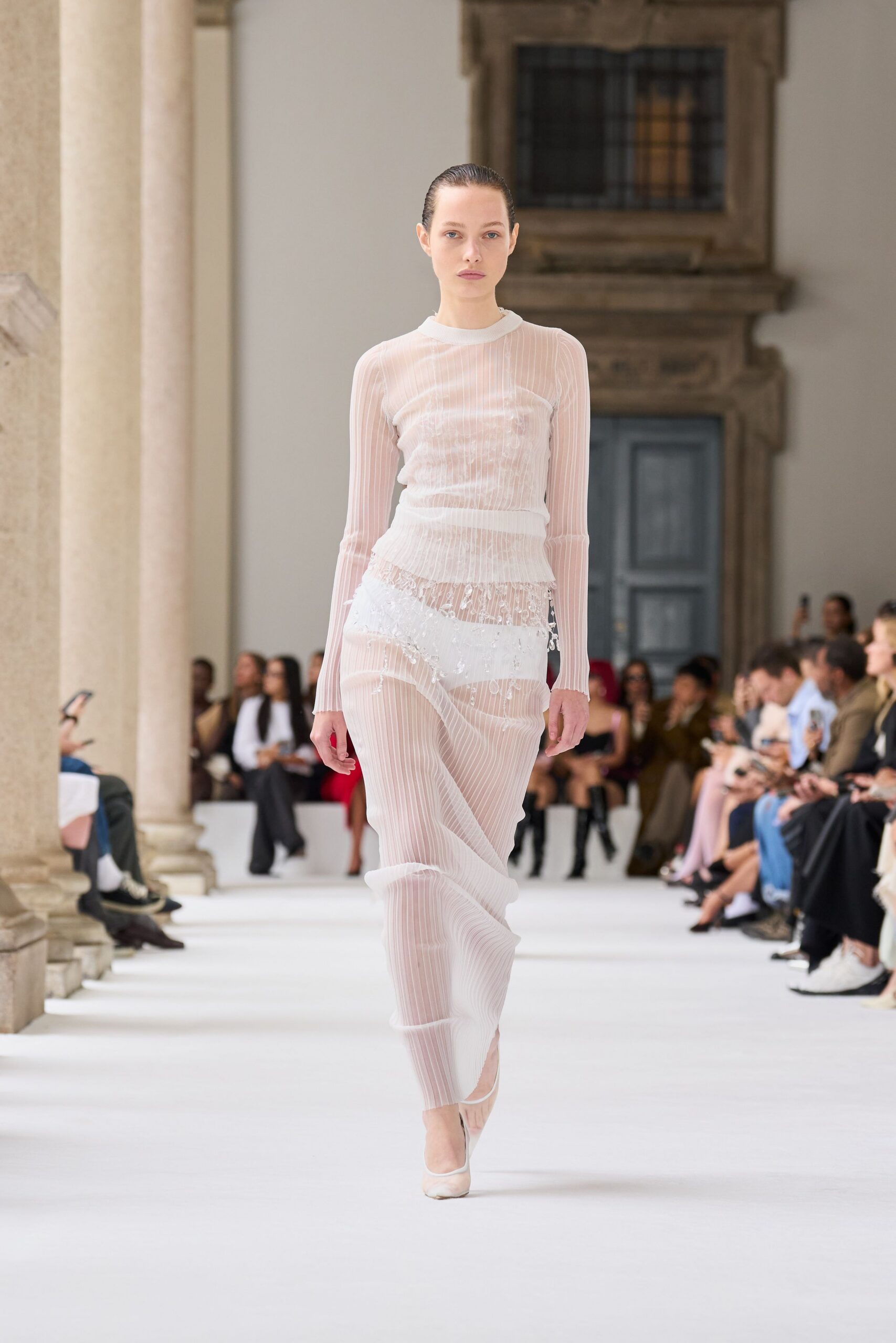 white sheer pleated gown