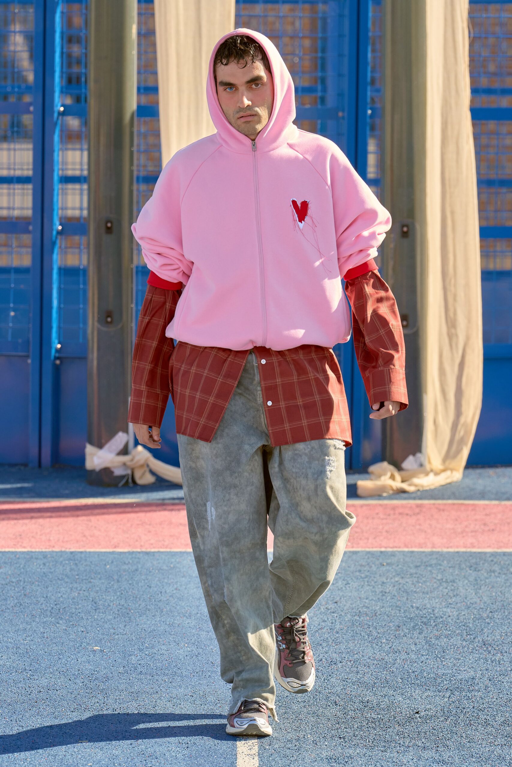 pink hoodie with red shirt and gray pants