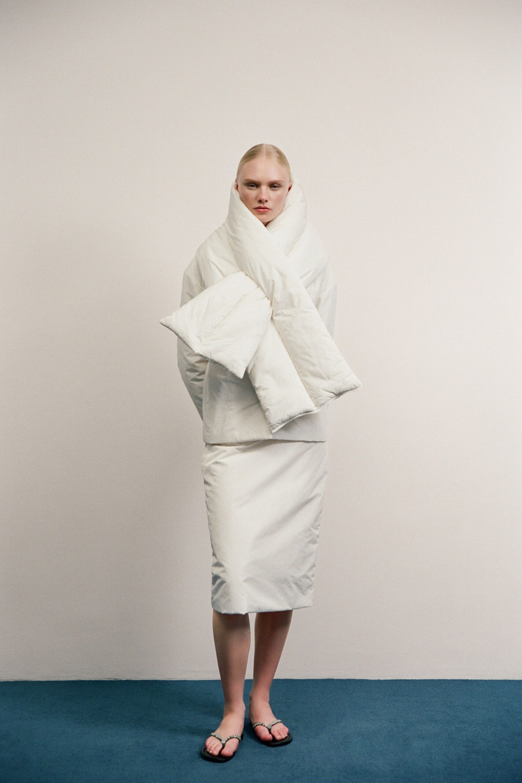 white cotton long-sleeve collared fitted padded top