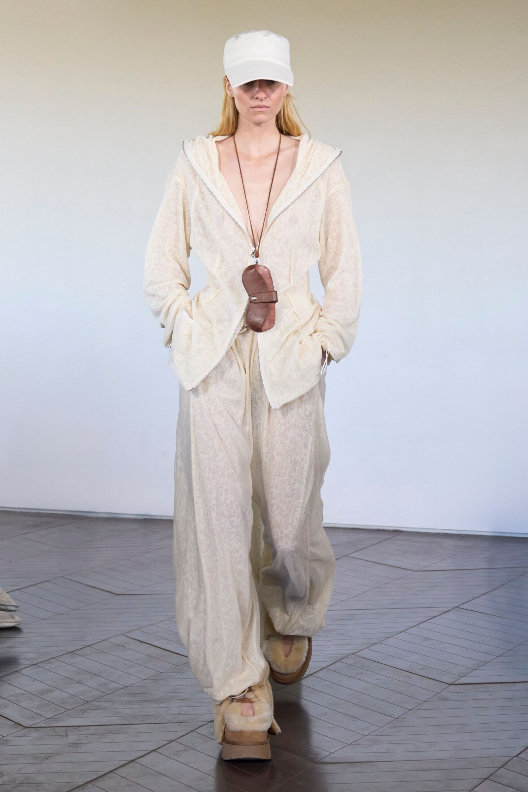 beige cotton long-sleeve v-neck relaxed zippered flowing jumpsuit