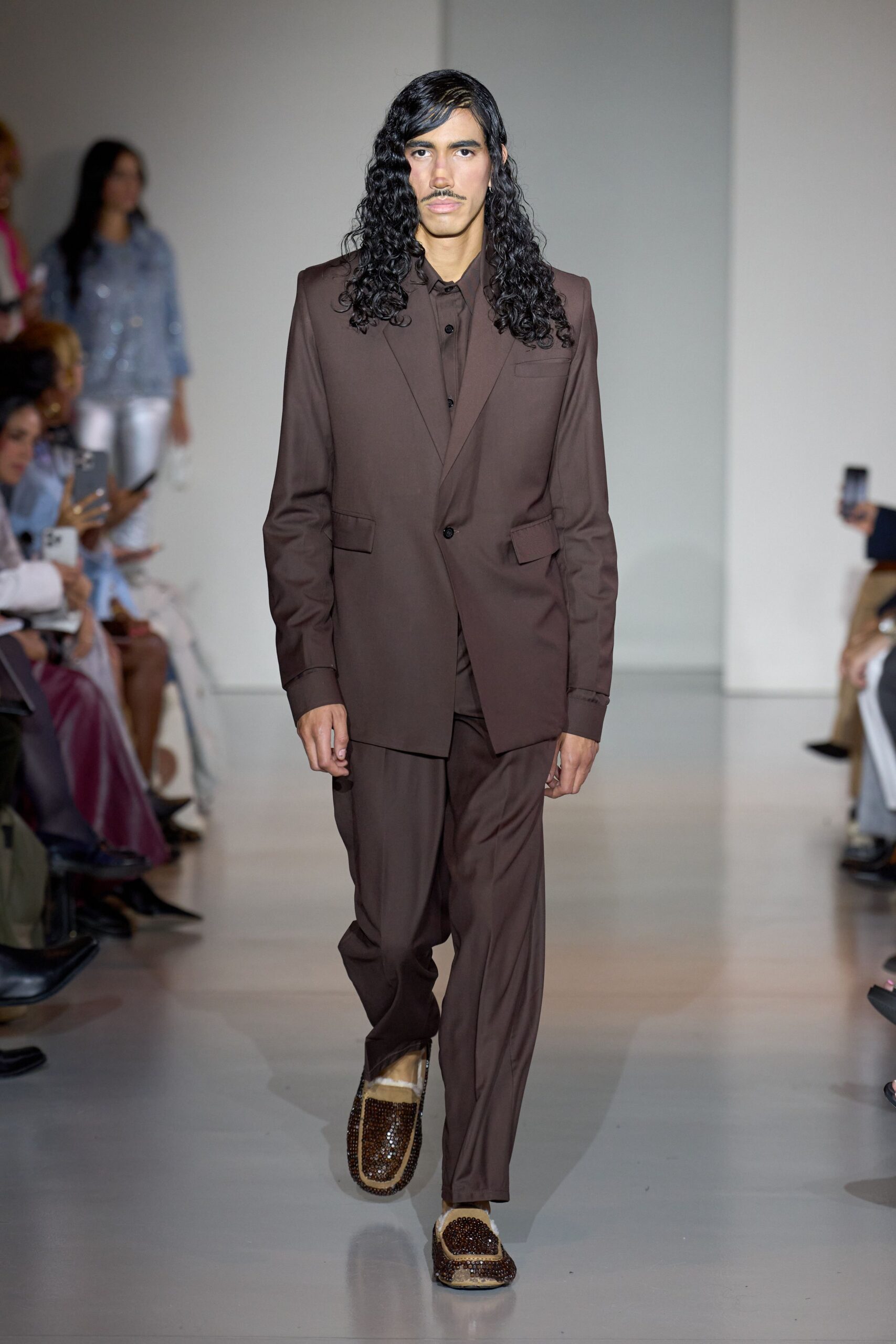 brown tailored suit with embellished shoes