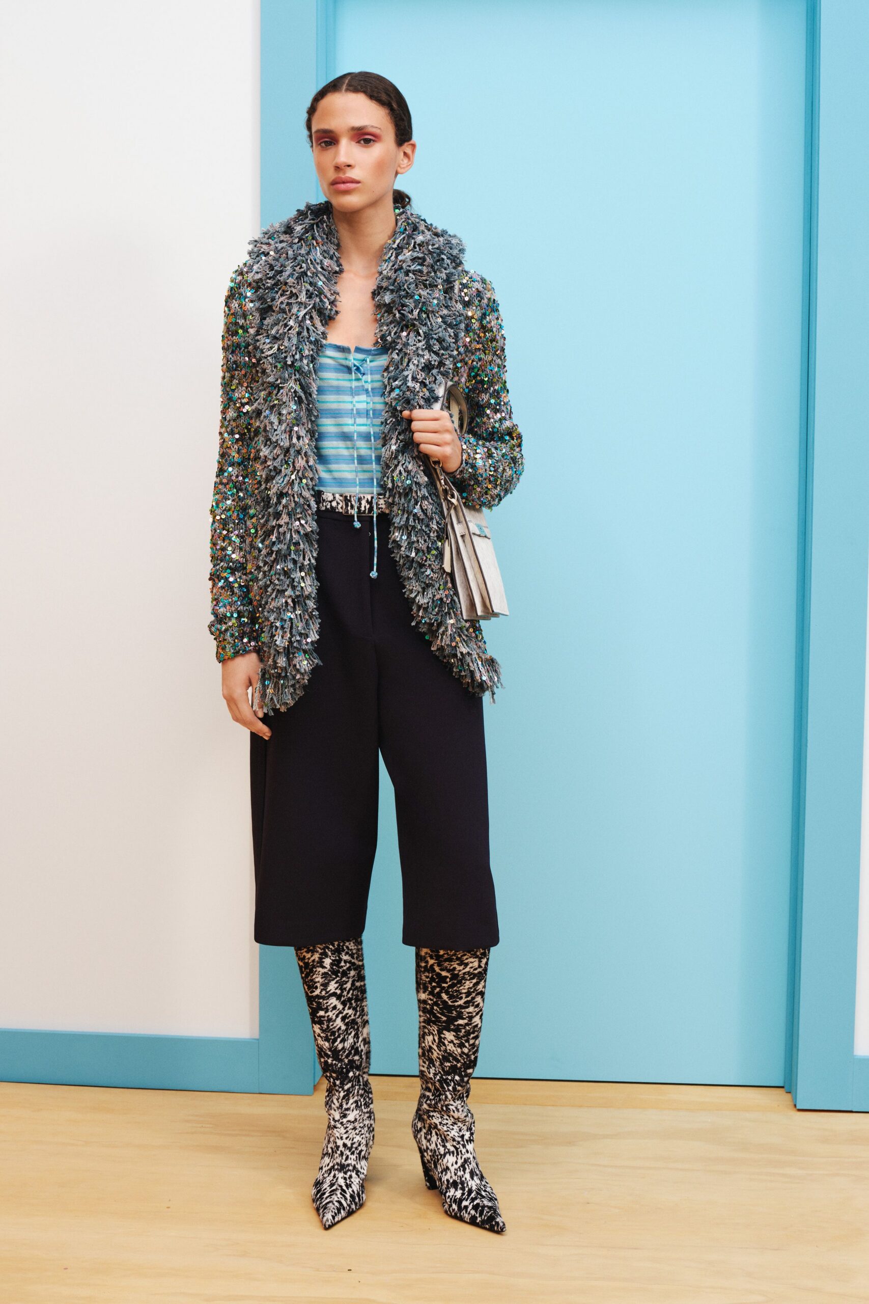 blue knit cardigan with striped top