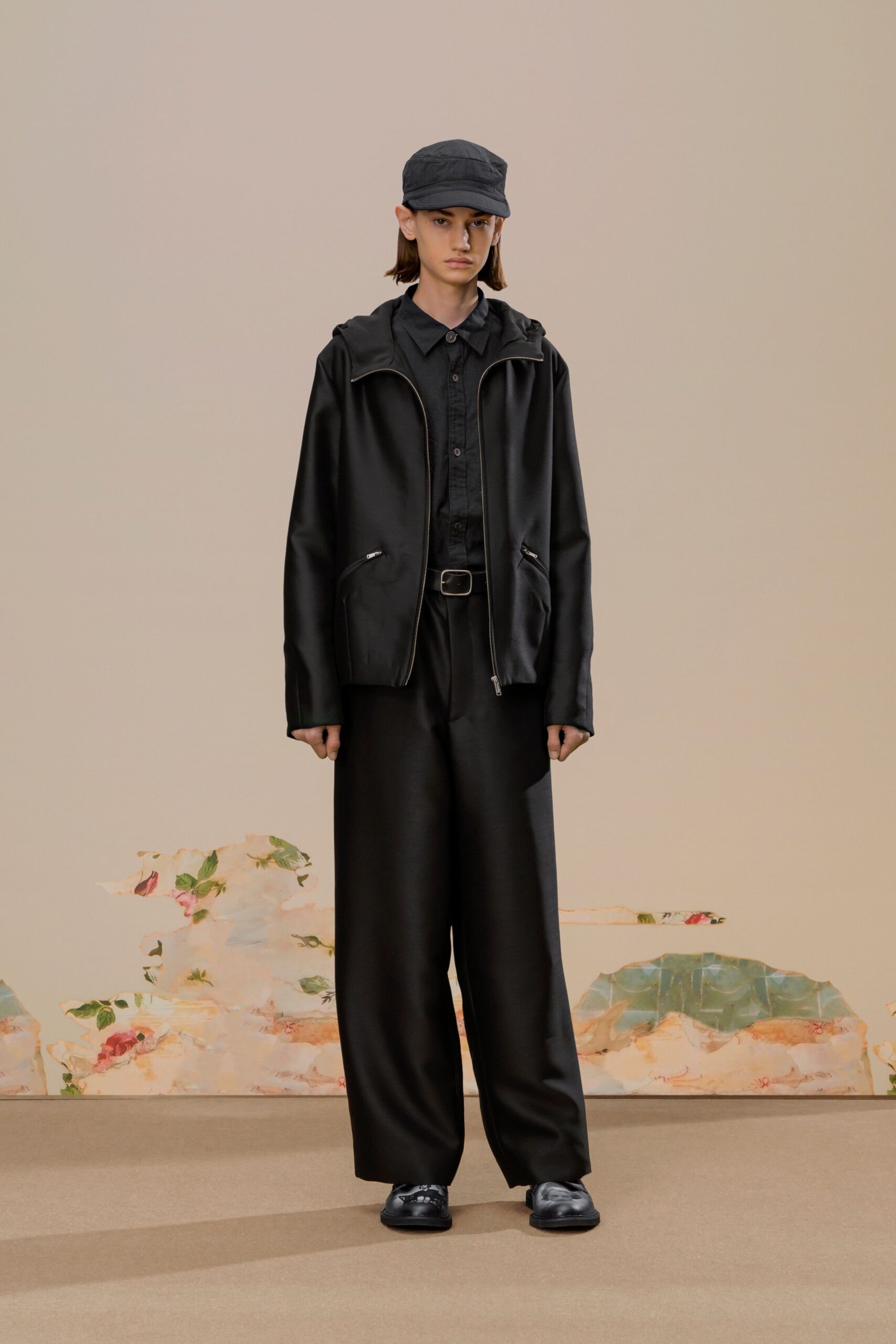 black leather jacket with wide-leg pants