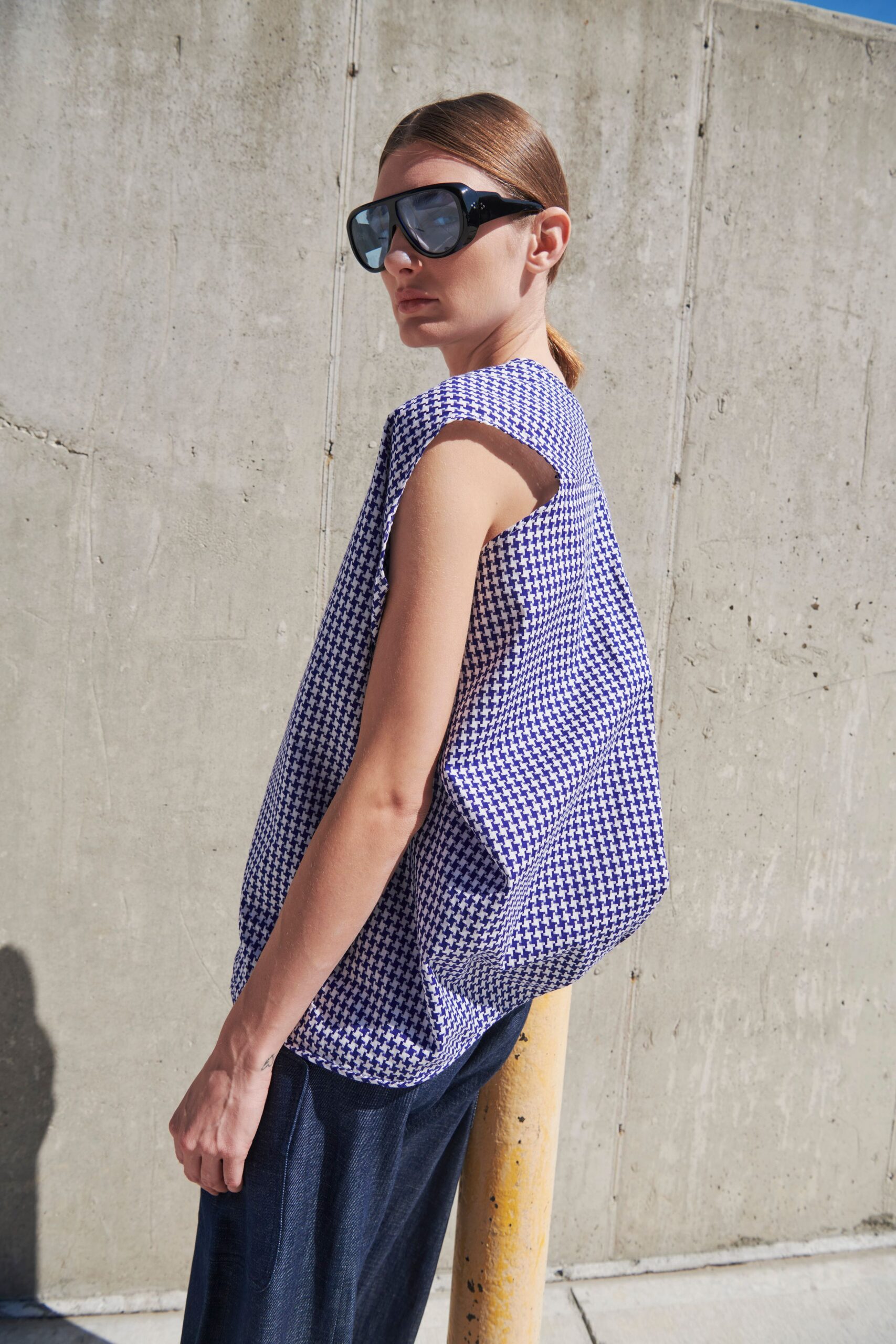 blue and white checked top with denim pants