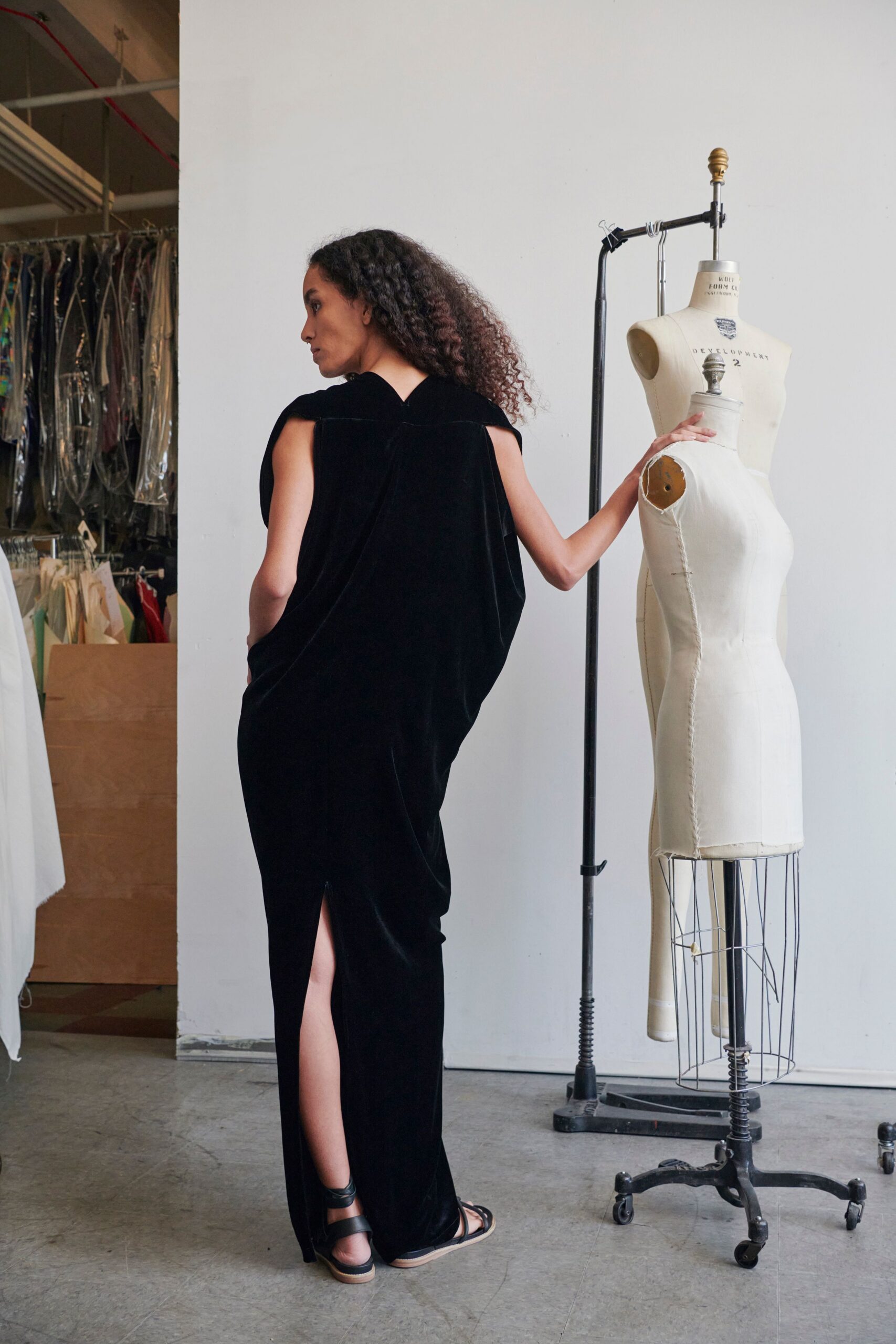 black velvet sleeveless gown with slit