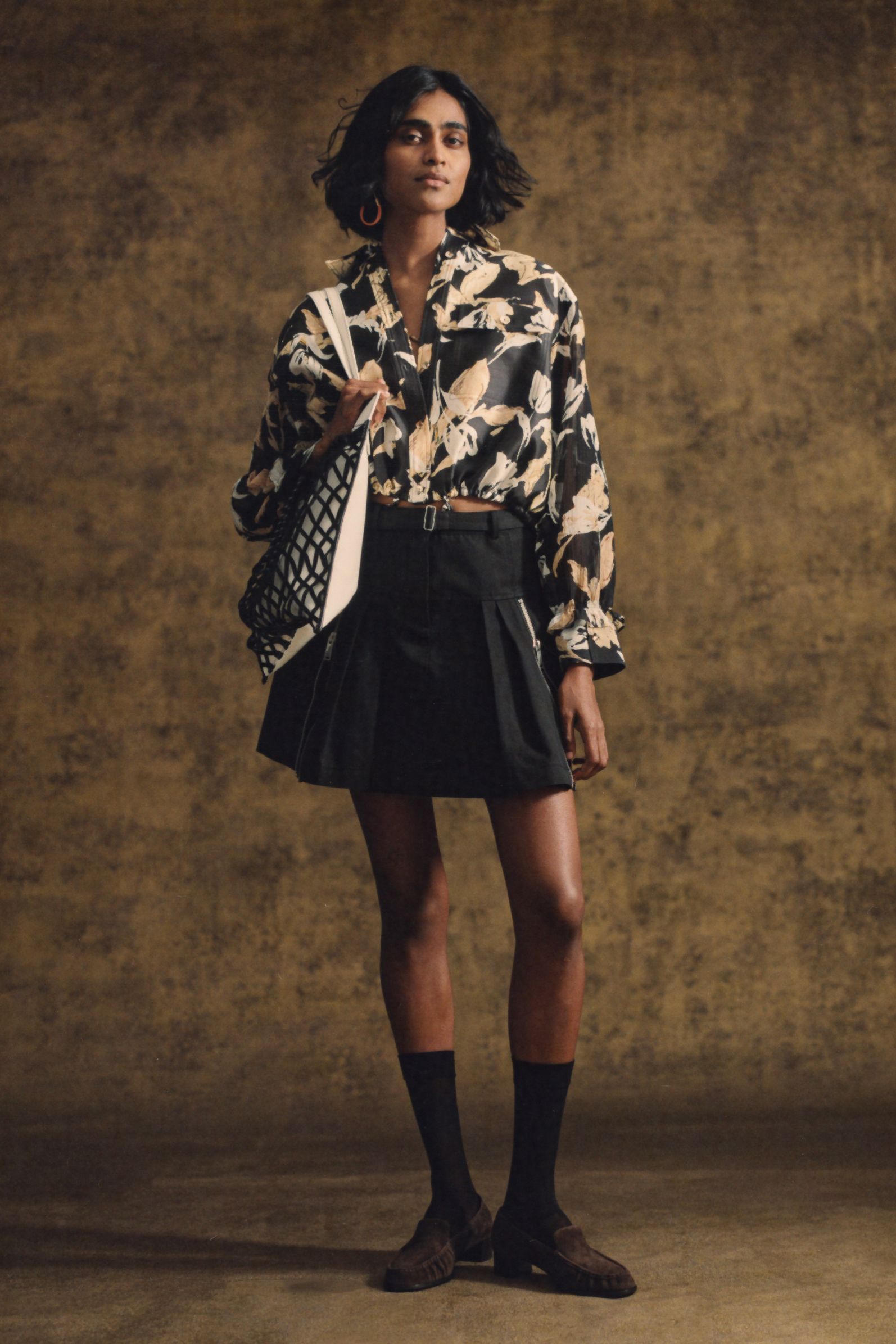 floral black and white shirt with pleated skirt