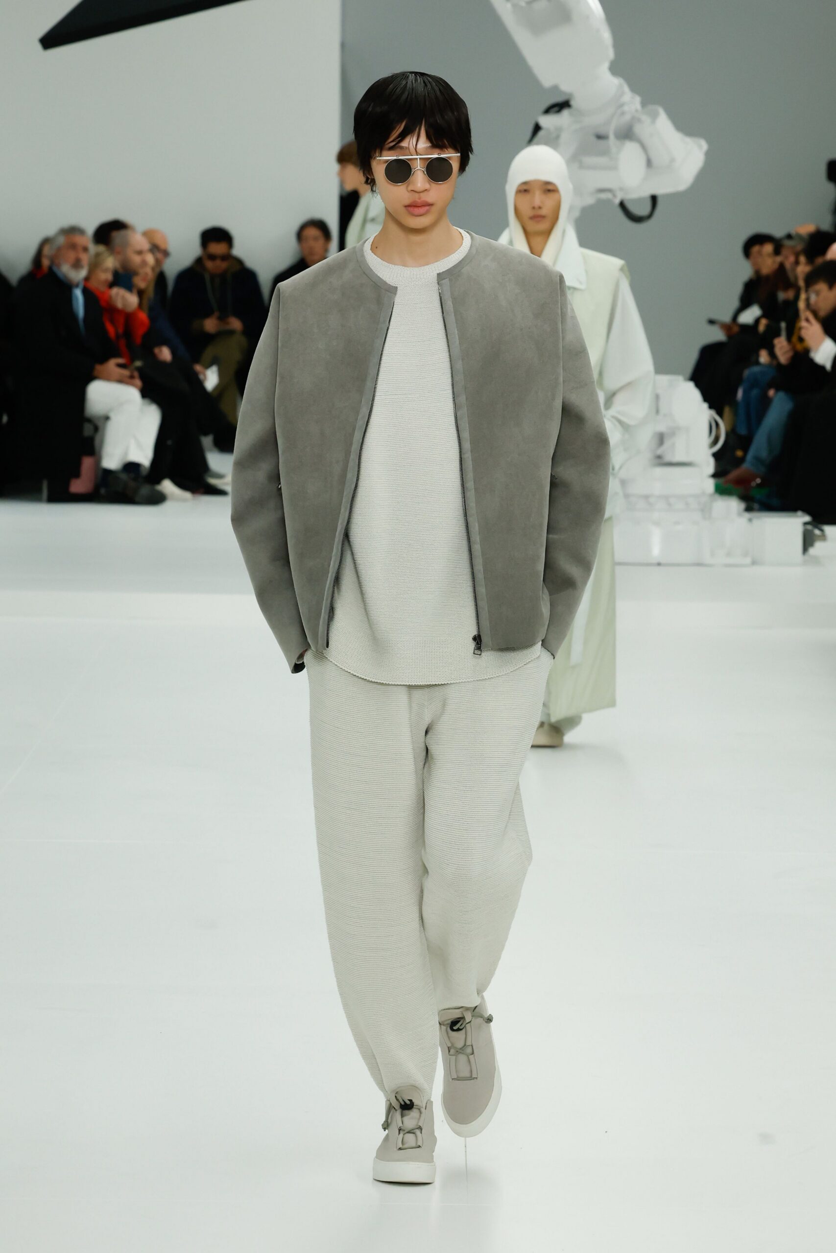 gray suede jacket with white top