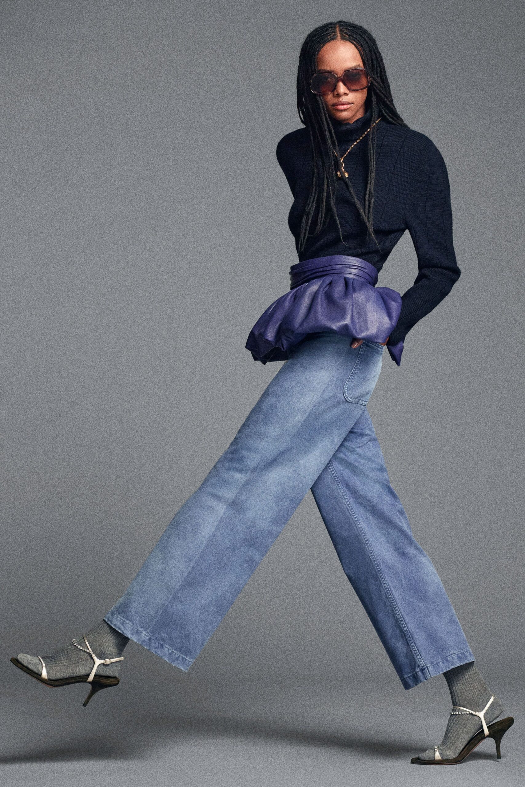 black fitted top with relaxed jeans