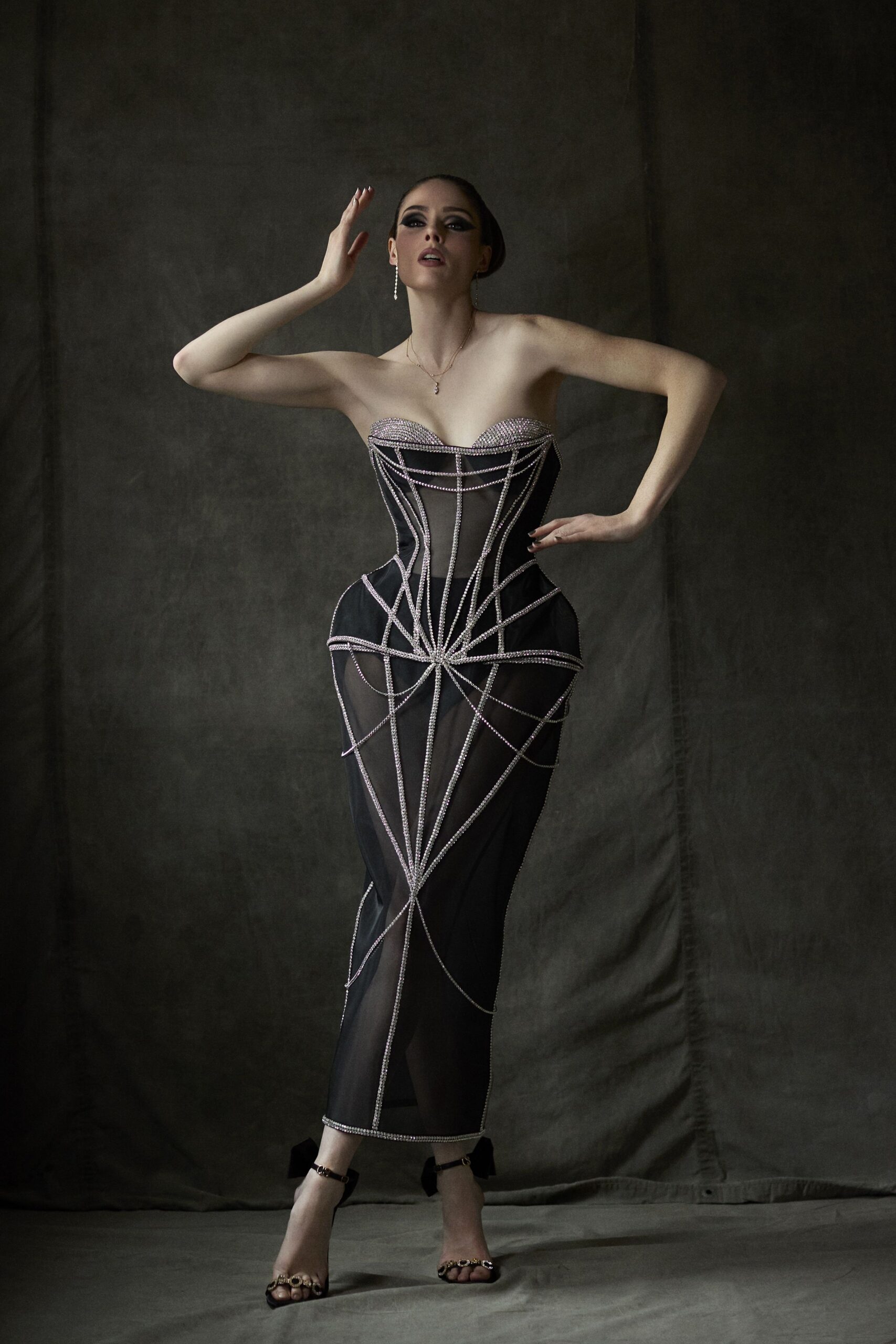 black silk strapless fitted ruched embellished sheer gown