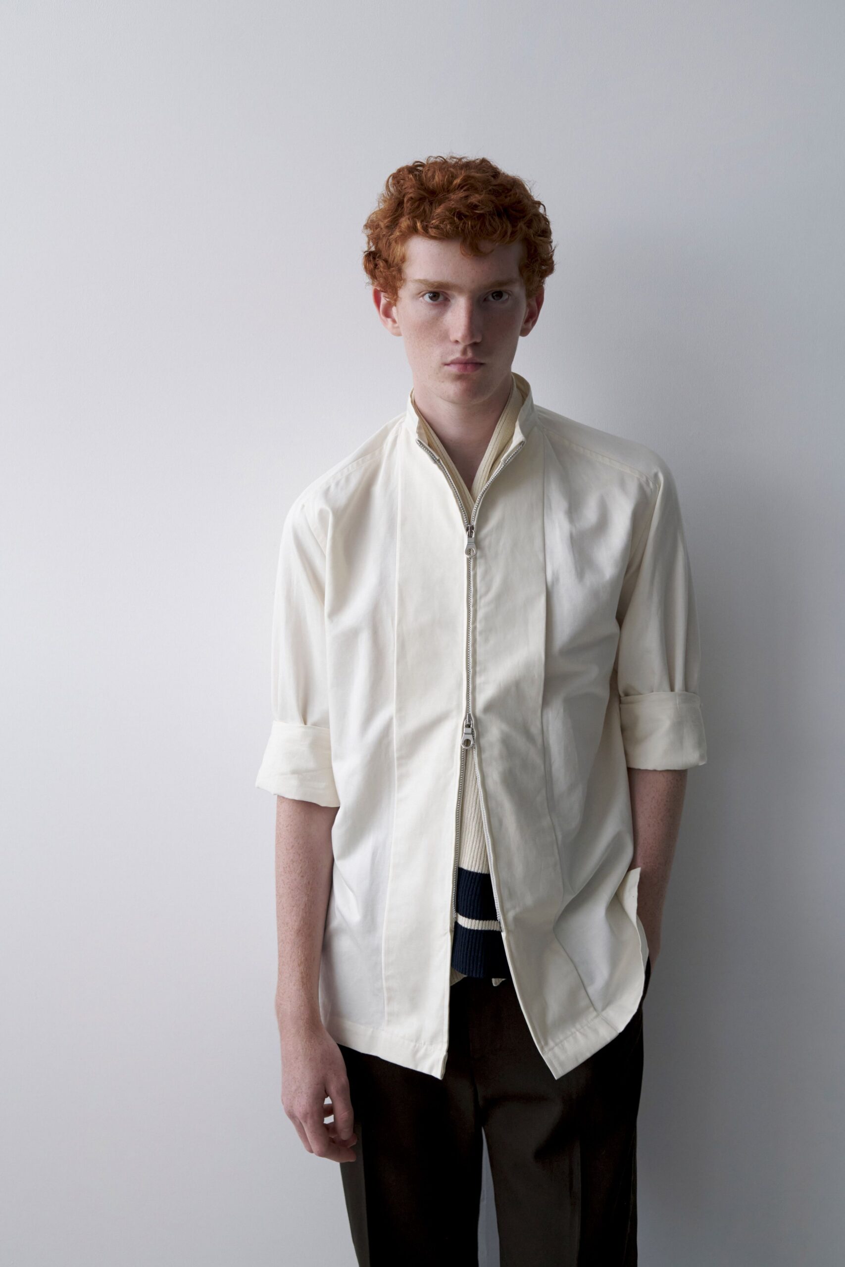 white relaxed shirt and black tailored pants