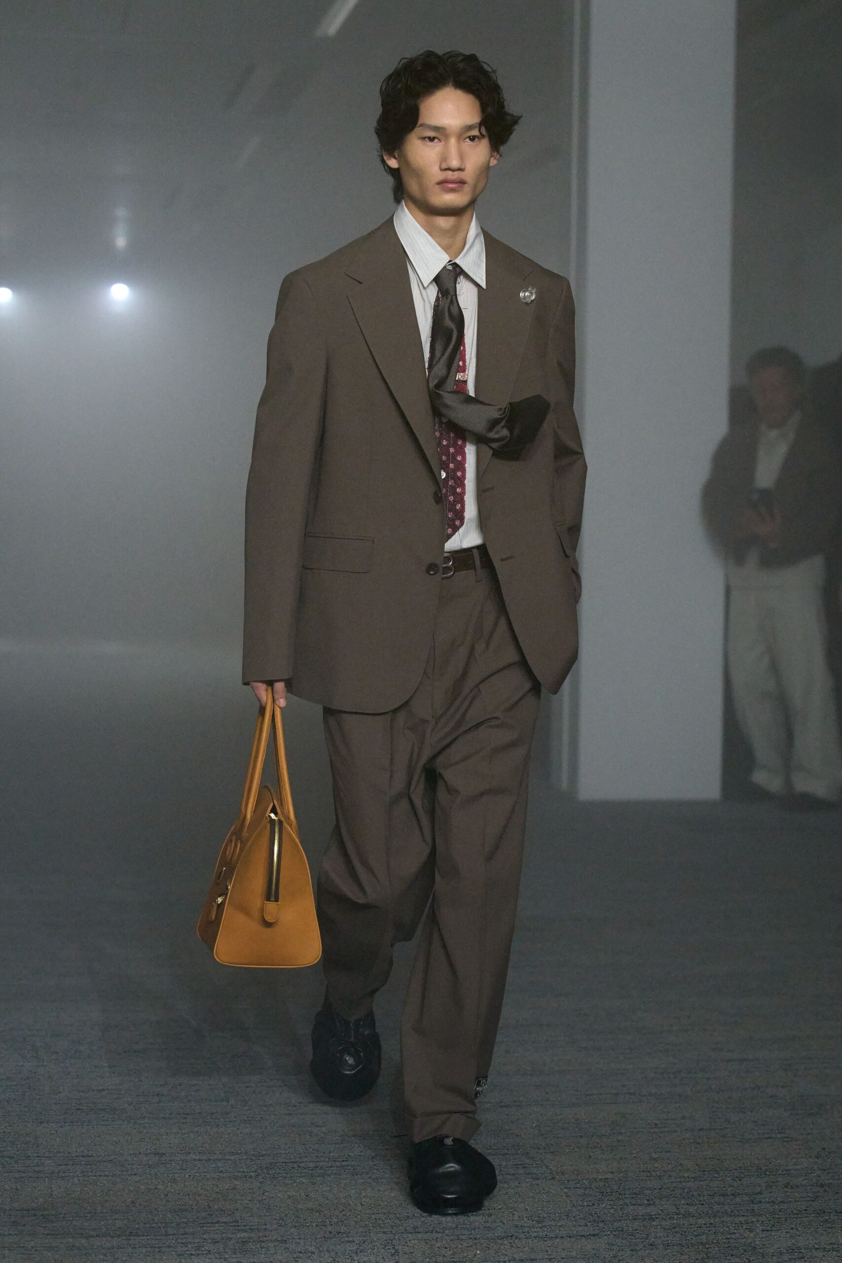brown tailored suit with white shirt