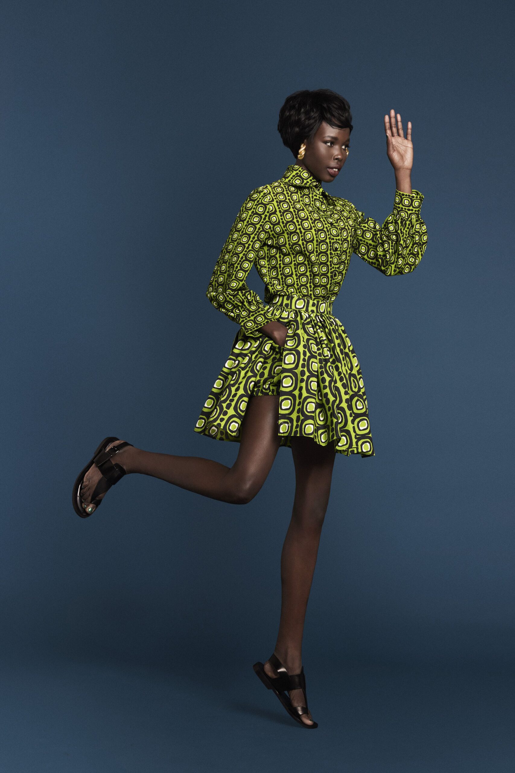 green cotton long-sleeve collared fitted pleated printed dress