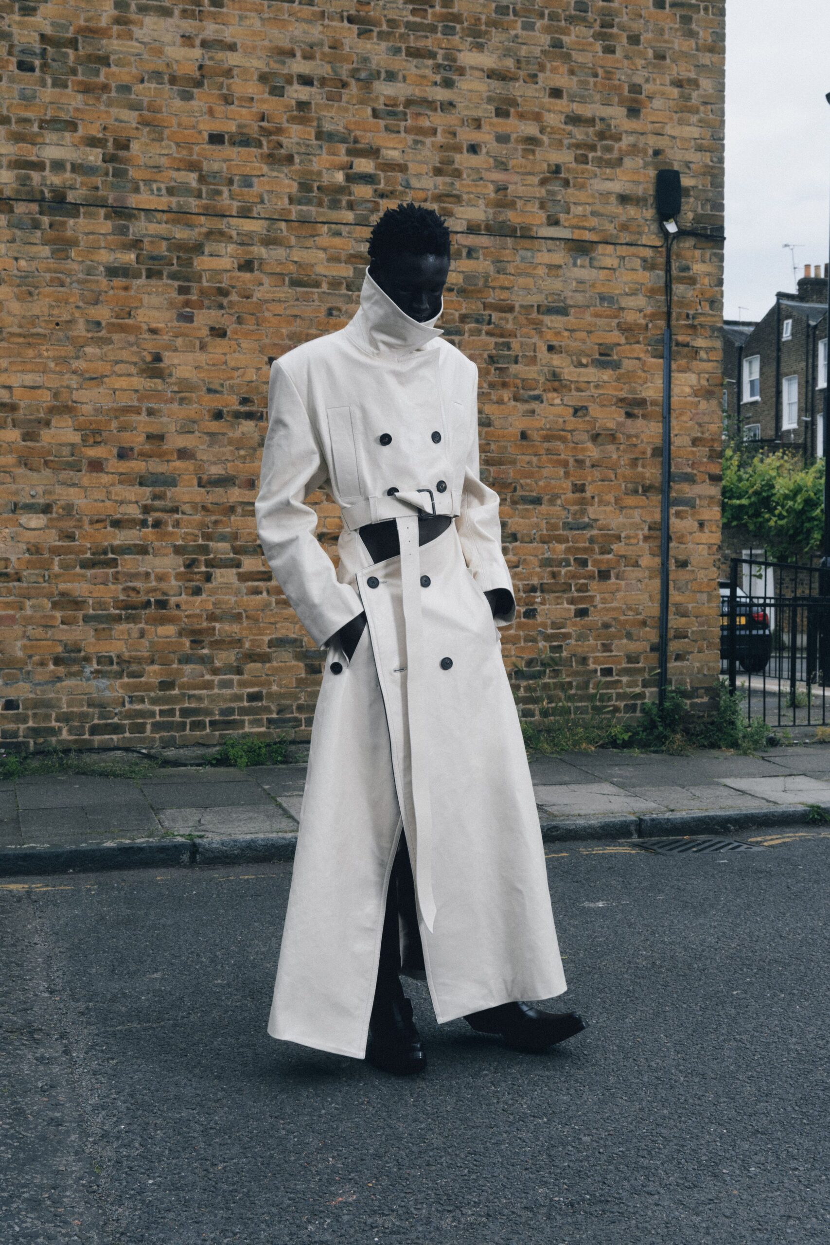white cotton long-sleeve collared relaxed belted maxi trench