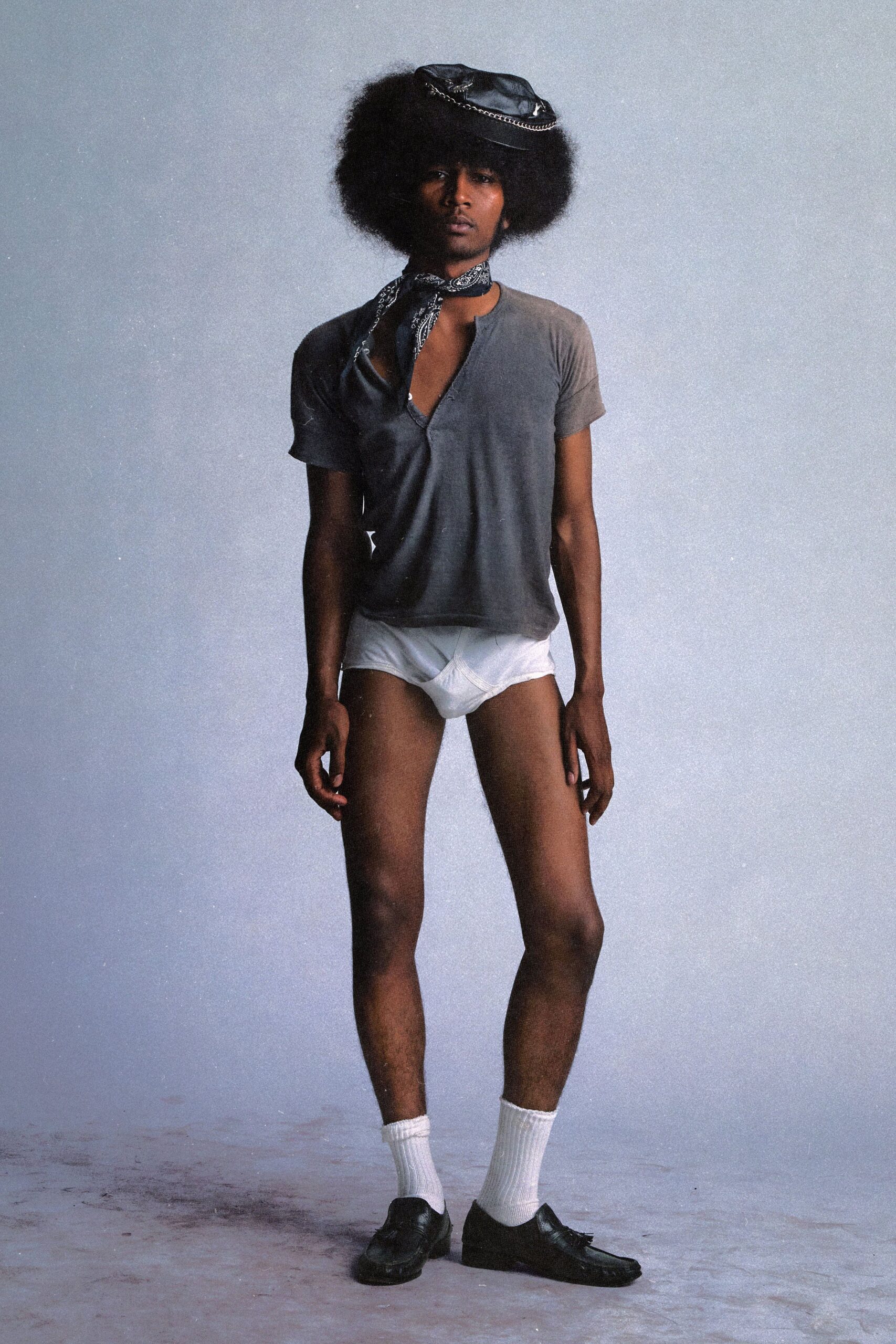 gray t-shirt with white shorts