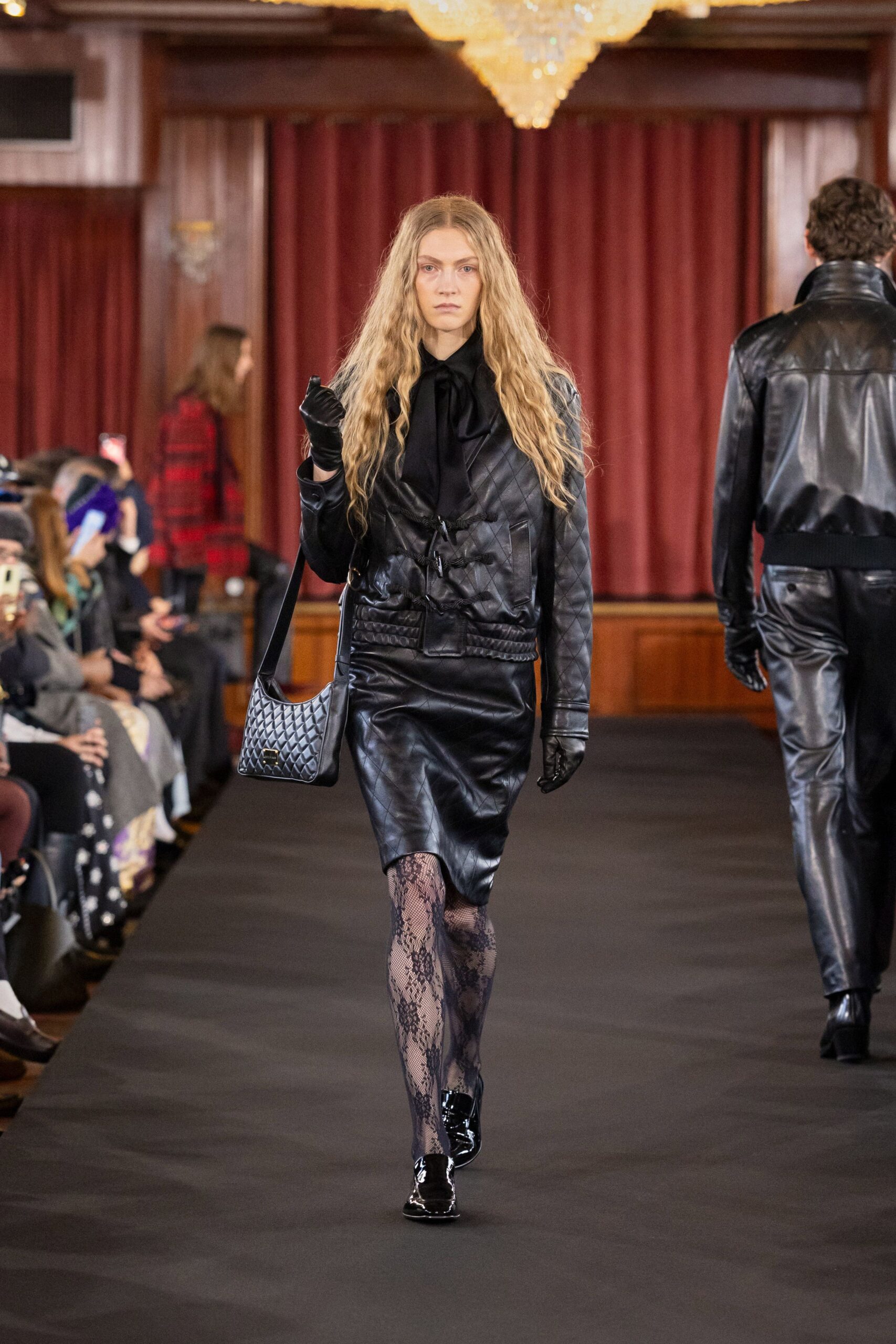 black leather jacket and skirt ensemble