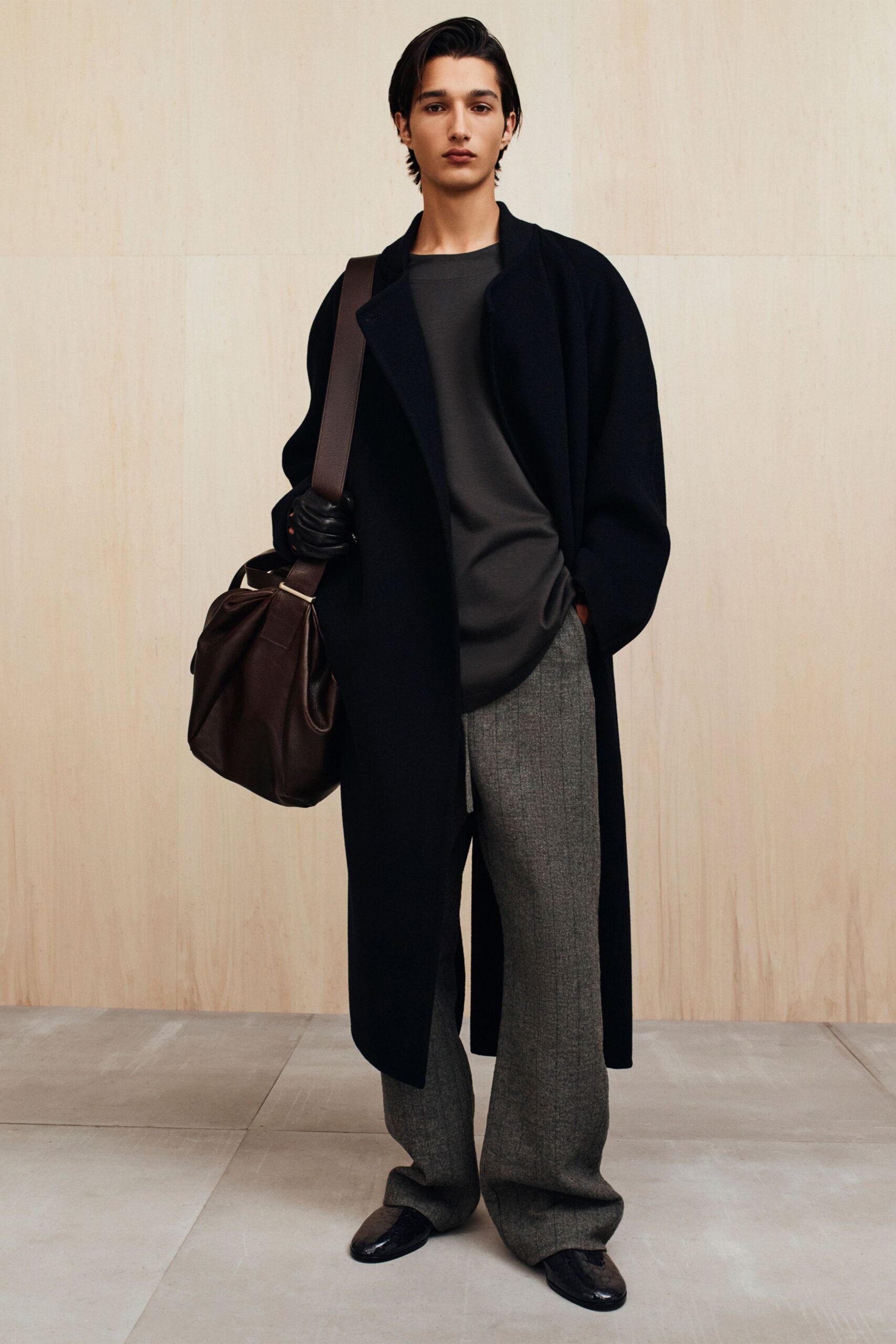 black wool coat gray top