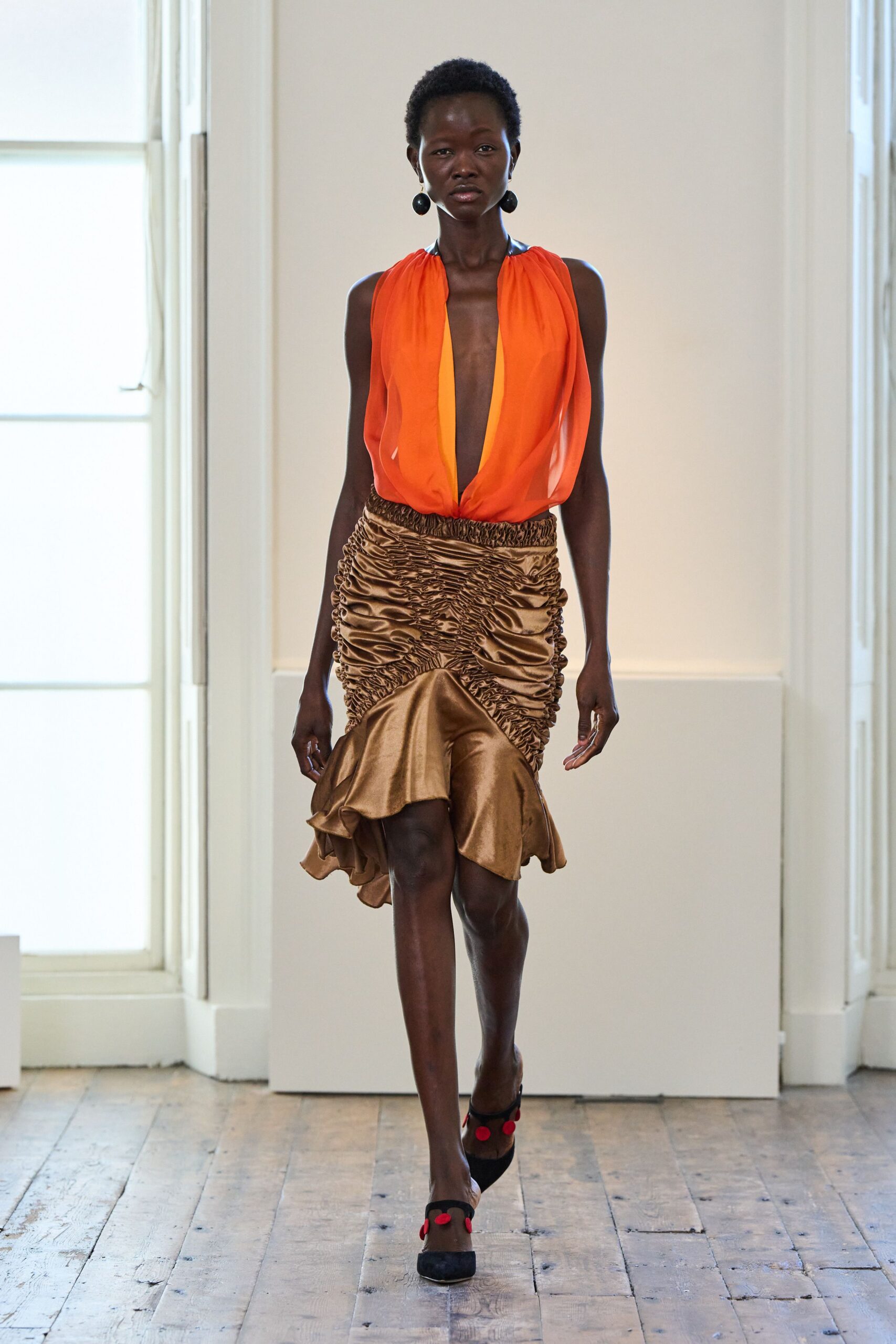 orange silk sleeveless v-neck fitted draped flowing top