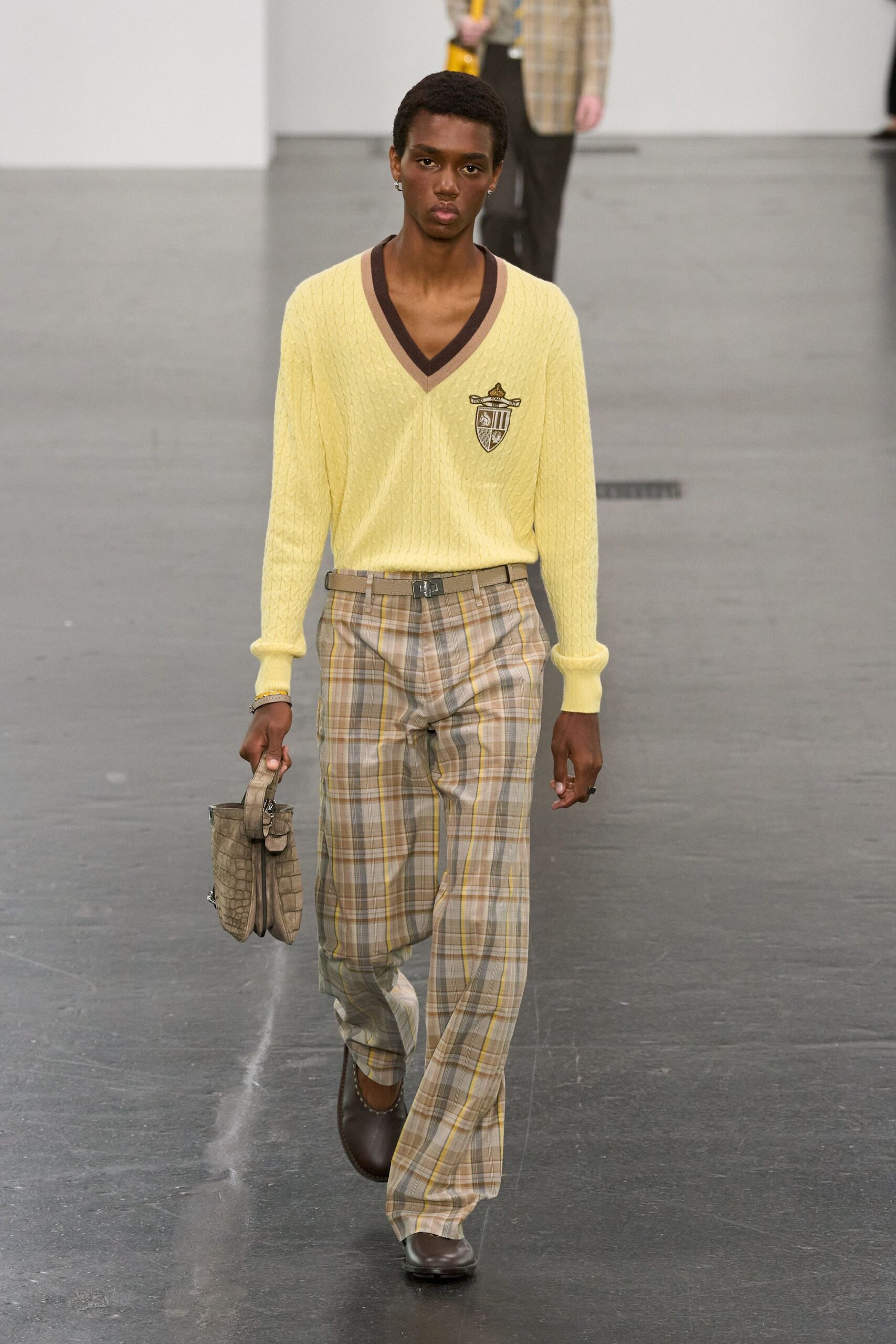 yellow relaxed sweater with checked pants