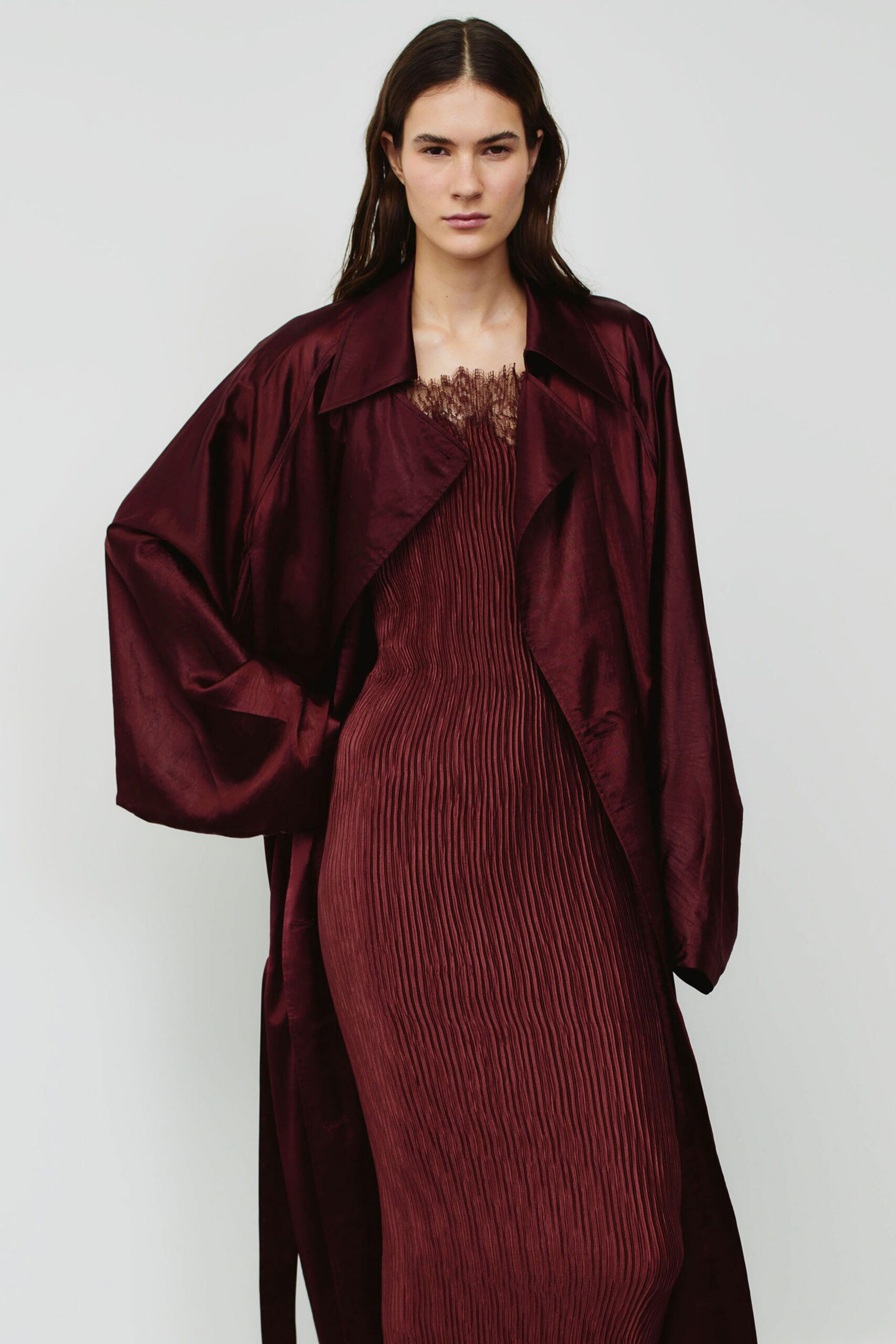 red pleated midi dress with maroon coat
