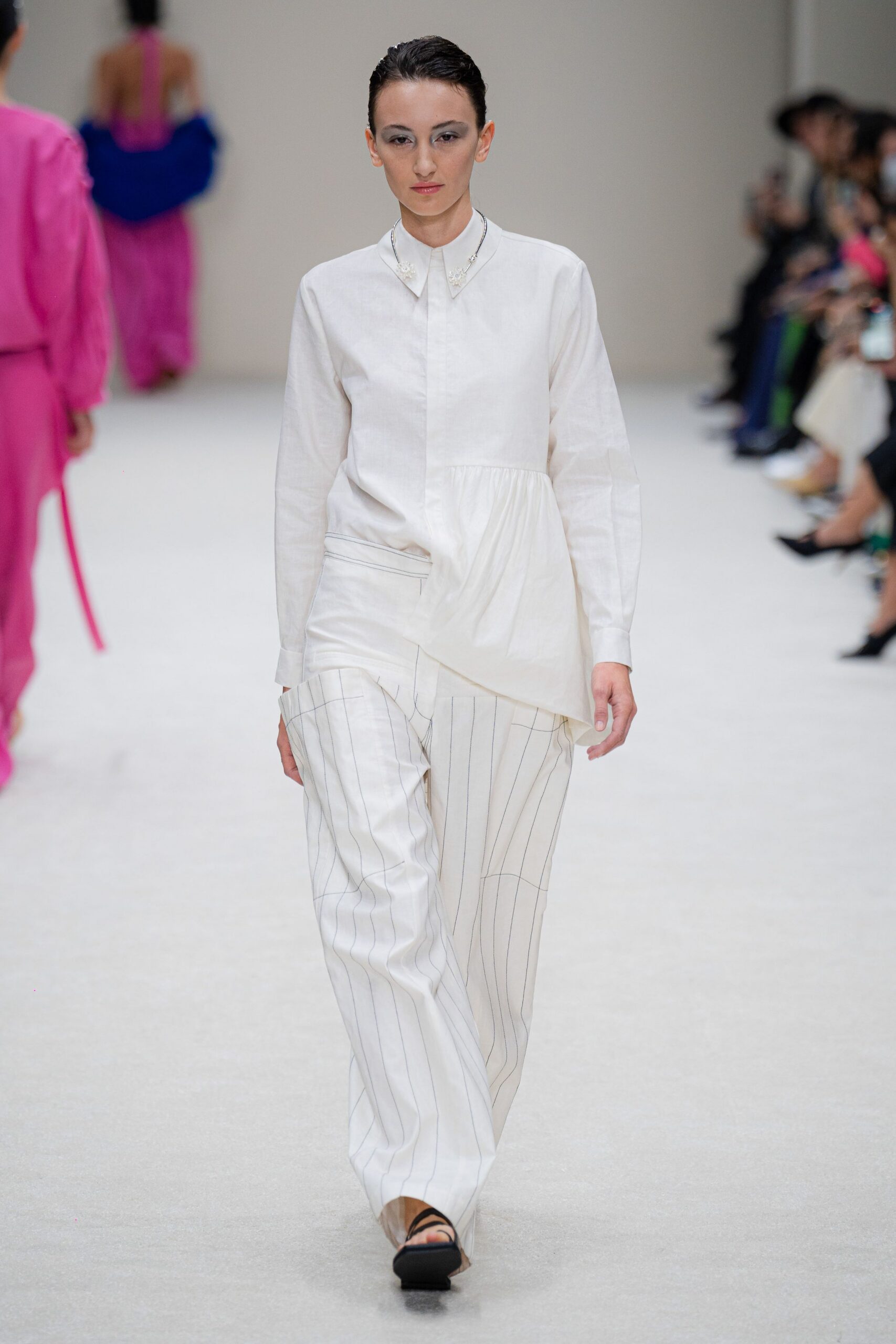 white relaxed shirt with striped pants