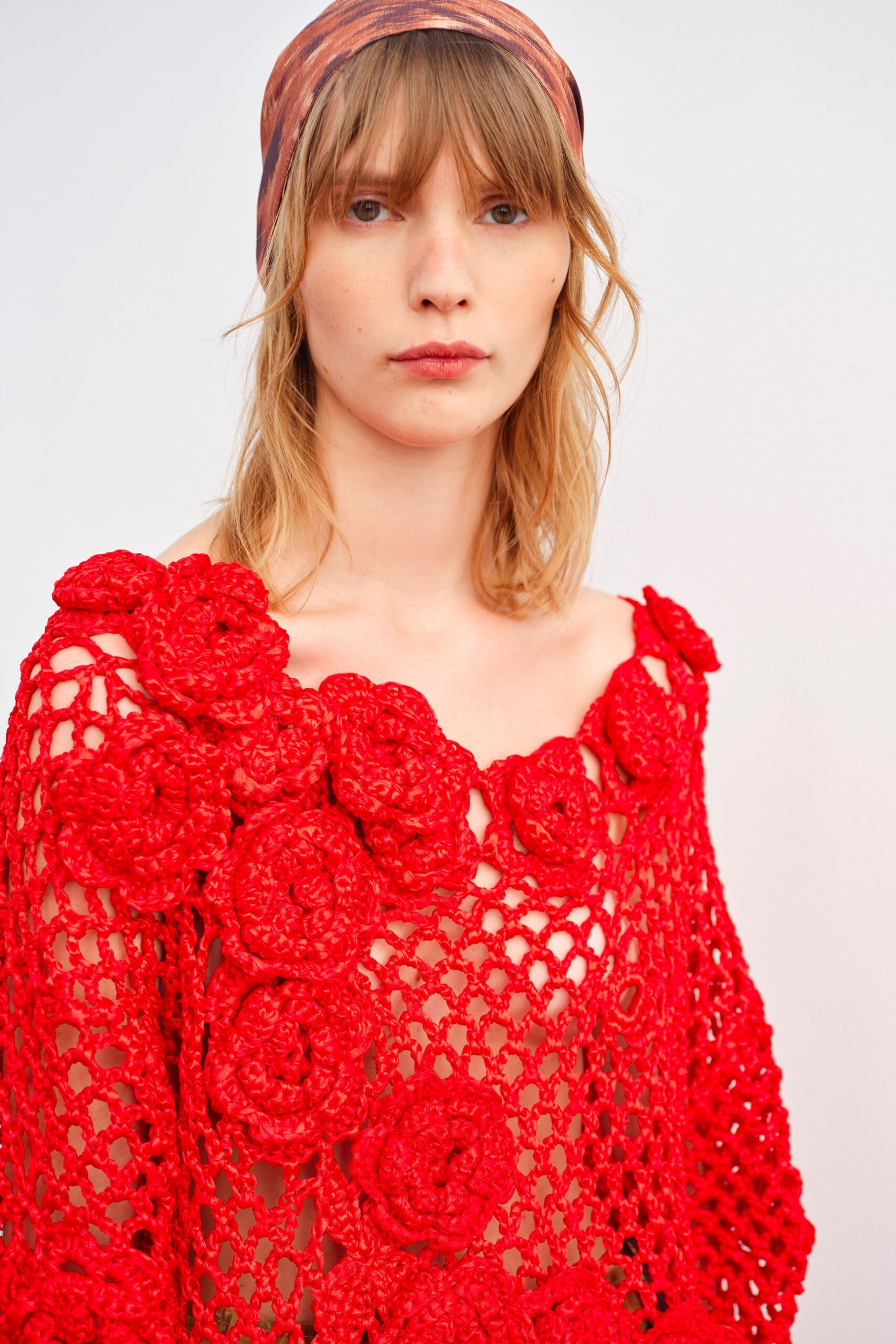red crochet top with headscarf