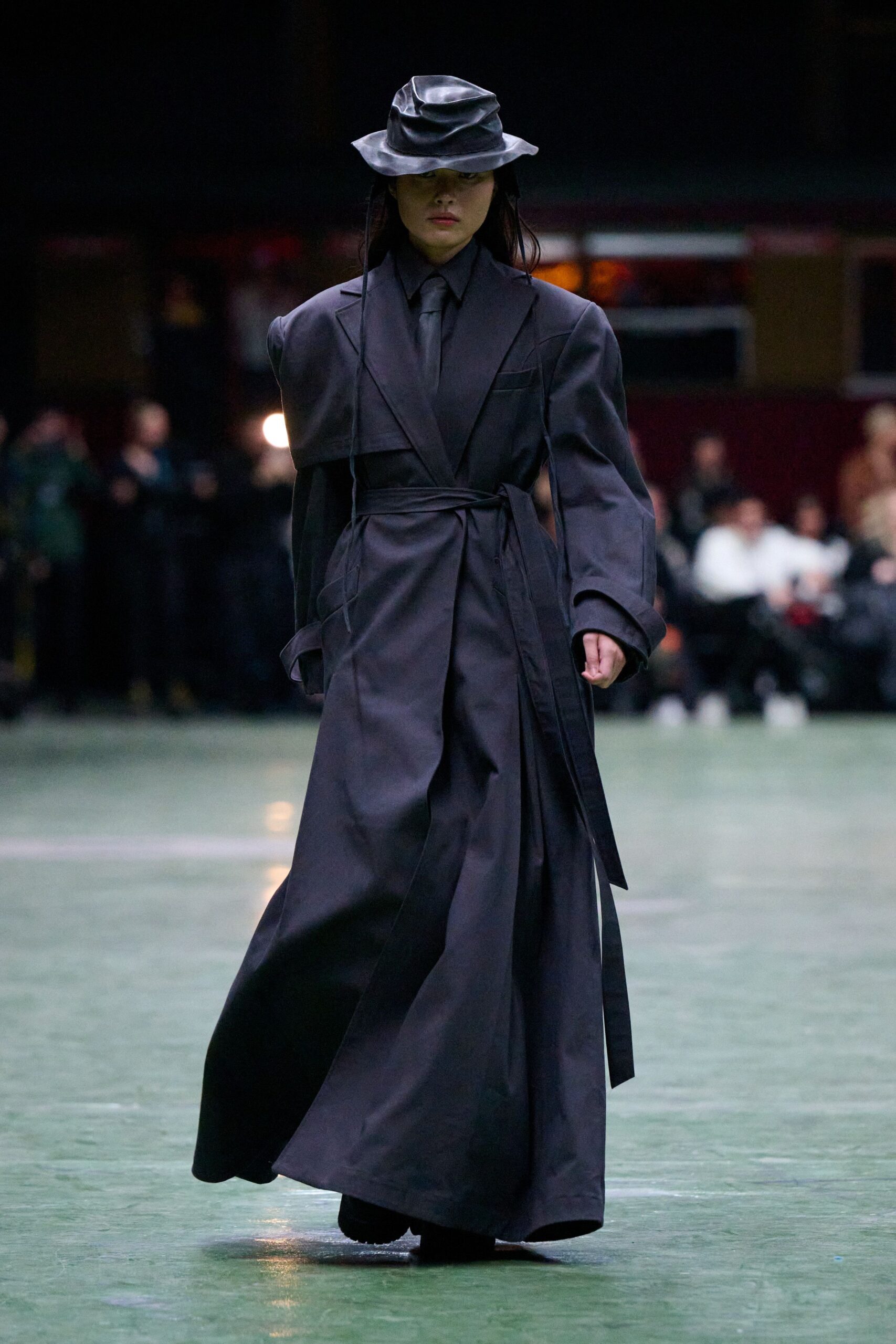 black leather coat and hat