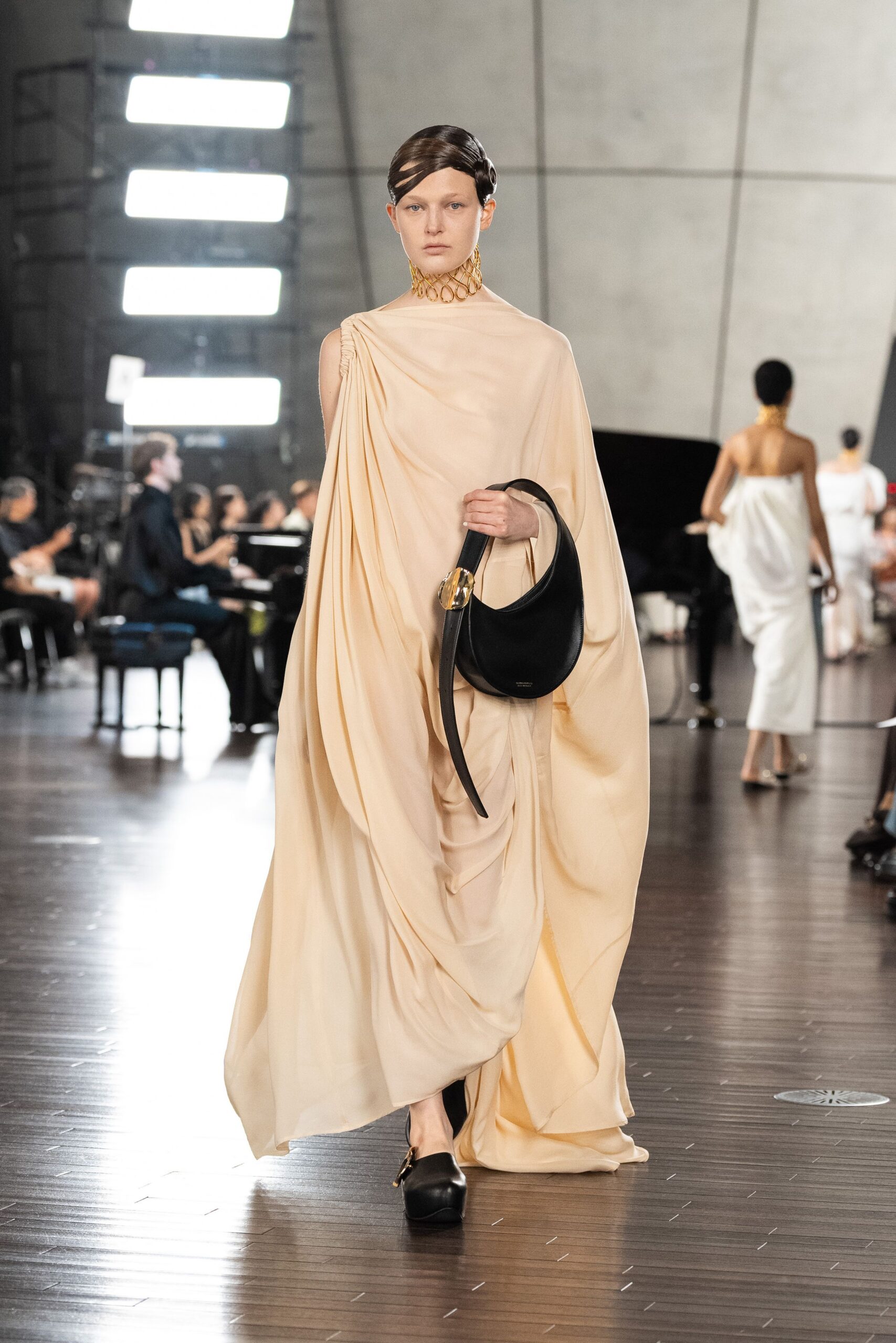 beige silk sleeveless high-neck relaxed draped flowing gown