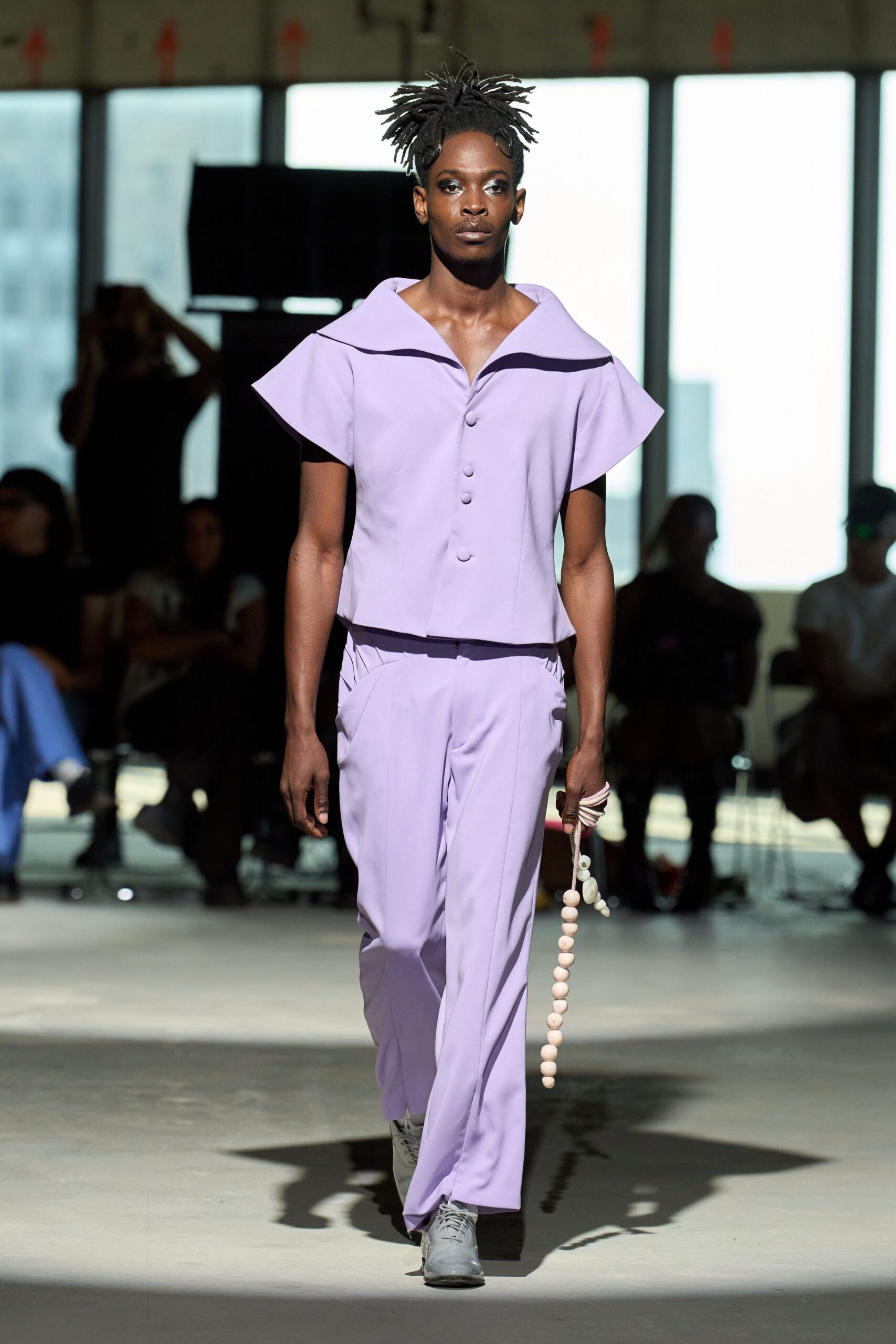 purple fitted top and pants